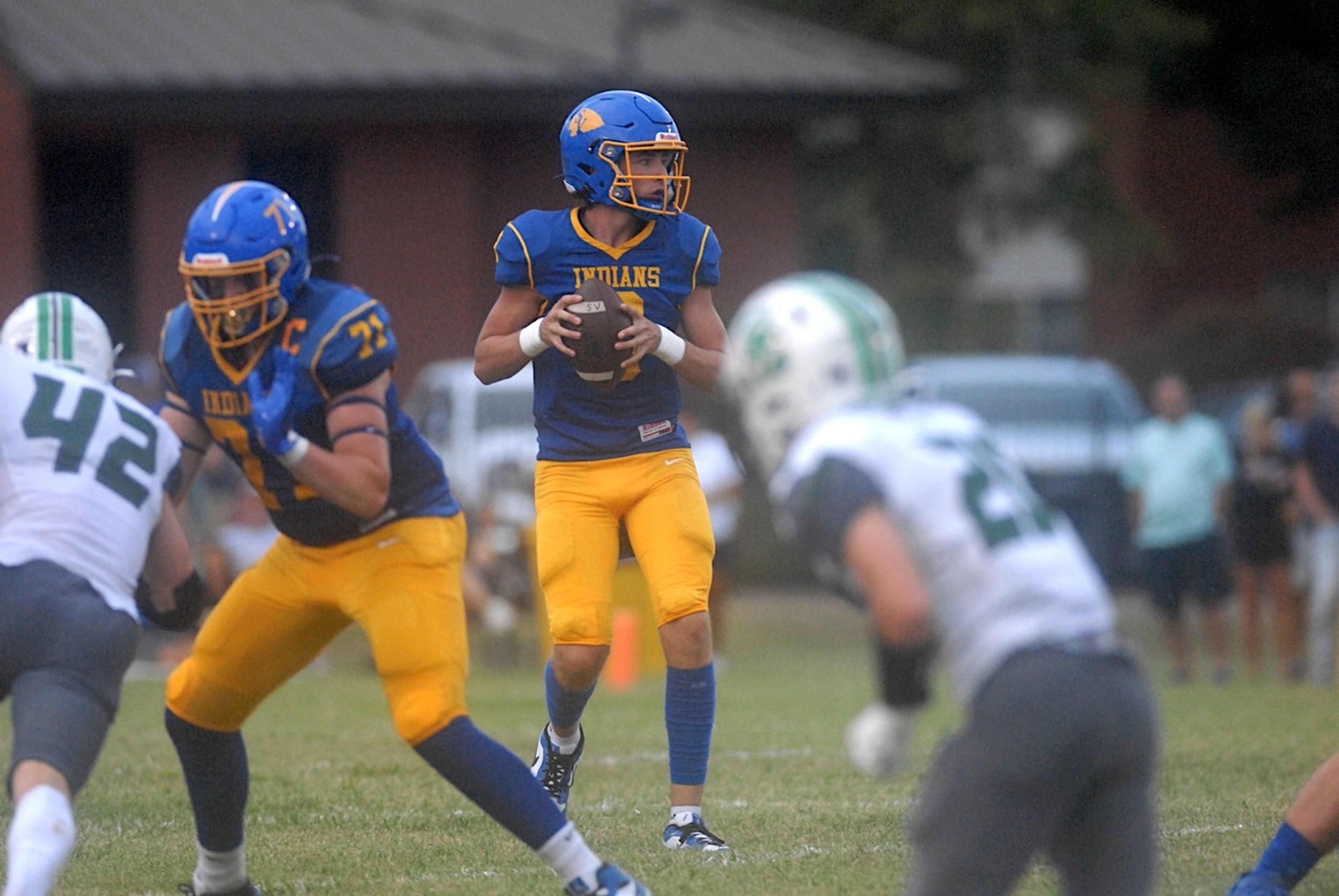 St. Vincent quarterback Nic Buchheit drops back to pass during a game against Ste. Genevieve on Friday, August 30, in Perryville, Mo. 