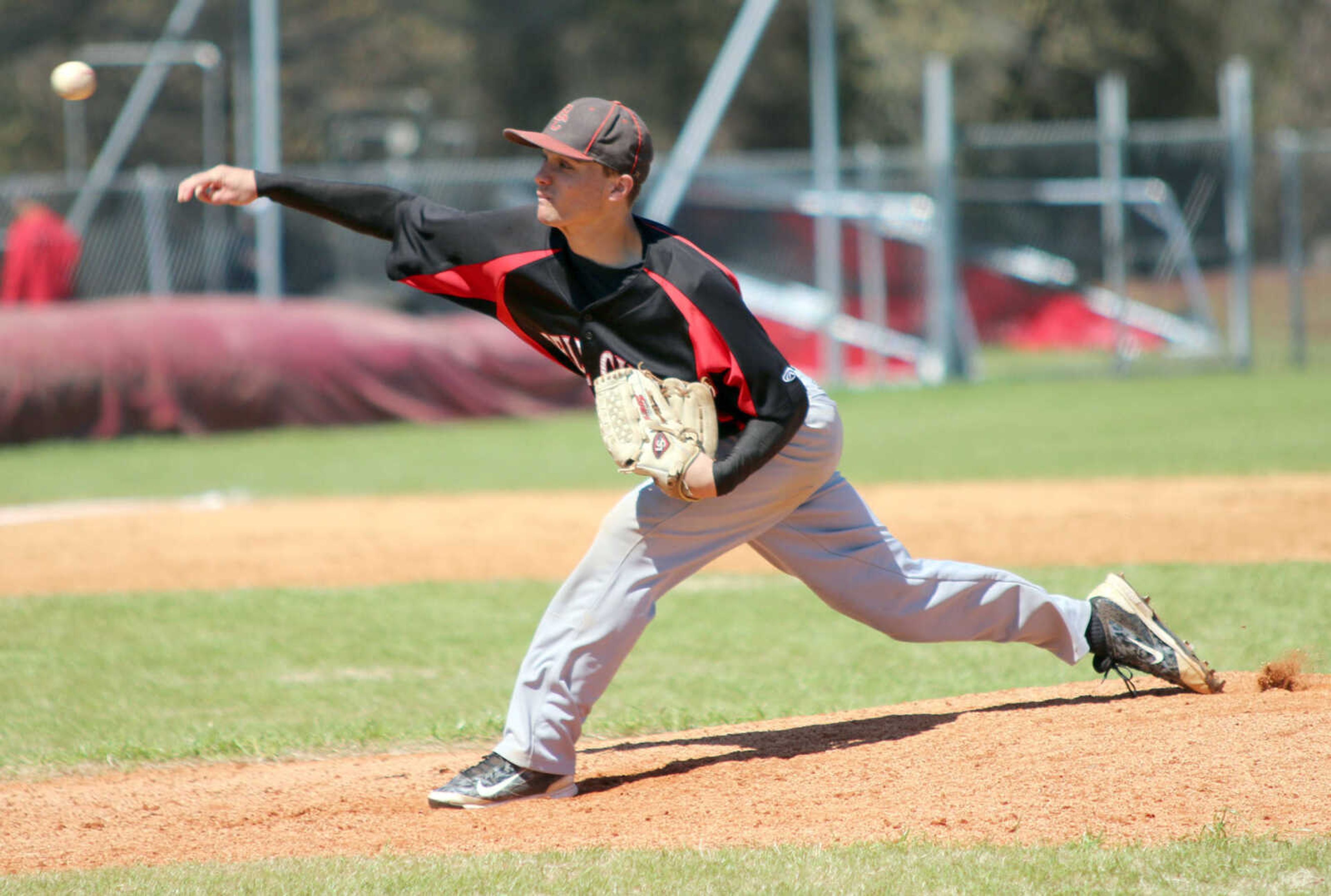 Bell City's Peyton Maddox delivers a pitch to a Sikeston batter in the sixth inning Saturday, April 2, 2016, at VFW Memorial Stadium in Sikeston, Mo.