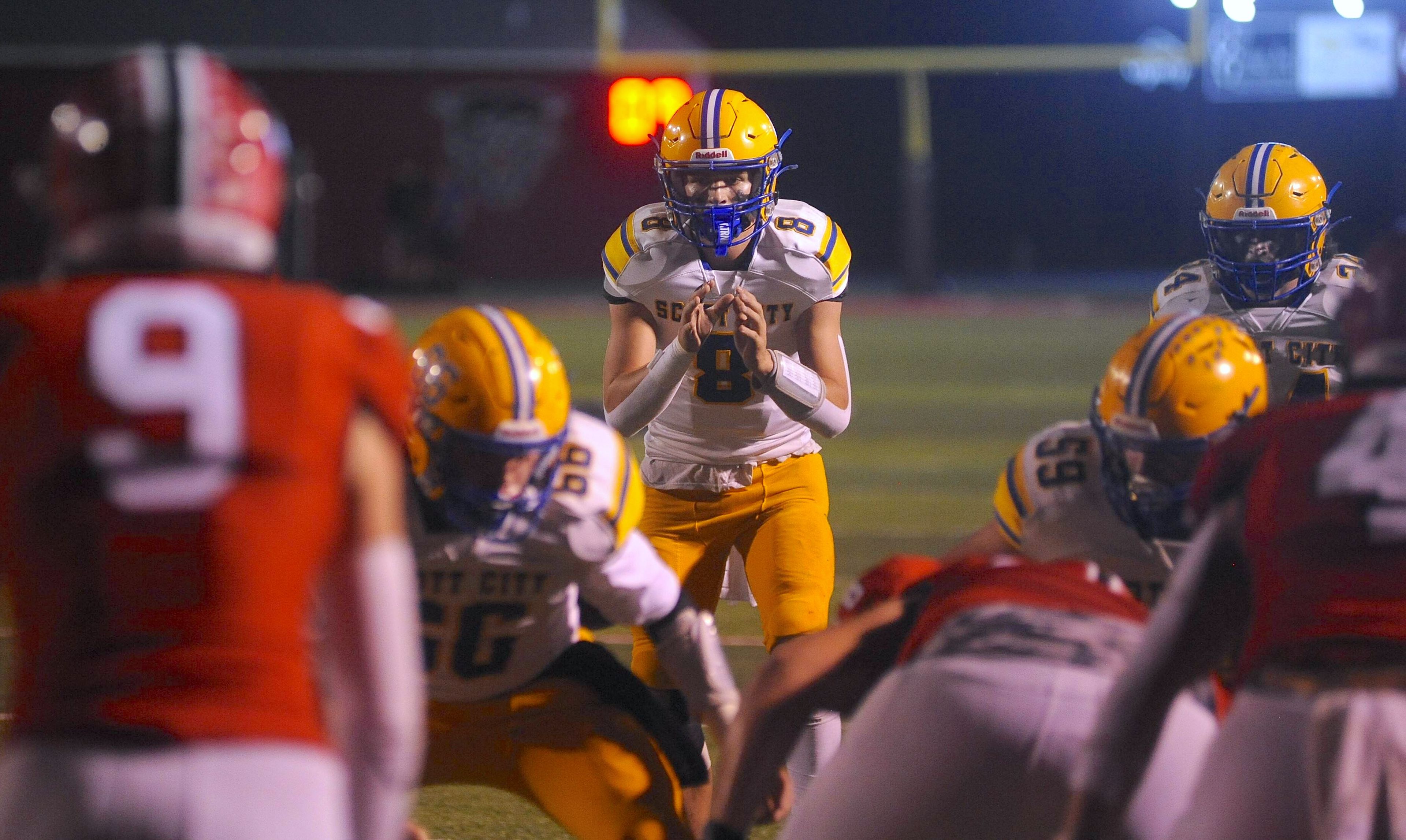 Scott City quarterback Jackson Gloth prepares to start a play during a game against Dexter on Friday, Oct. 25, at Charles Bland Stadium in Dexter.
