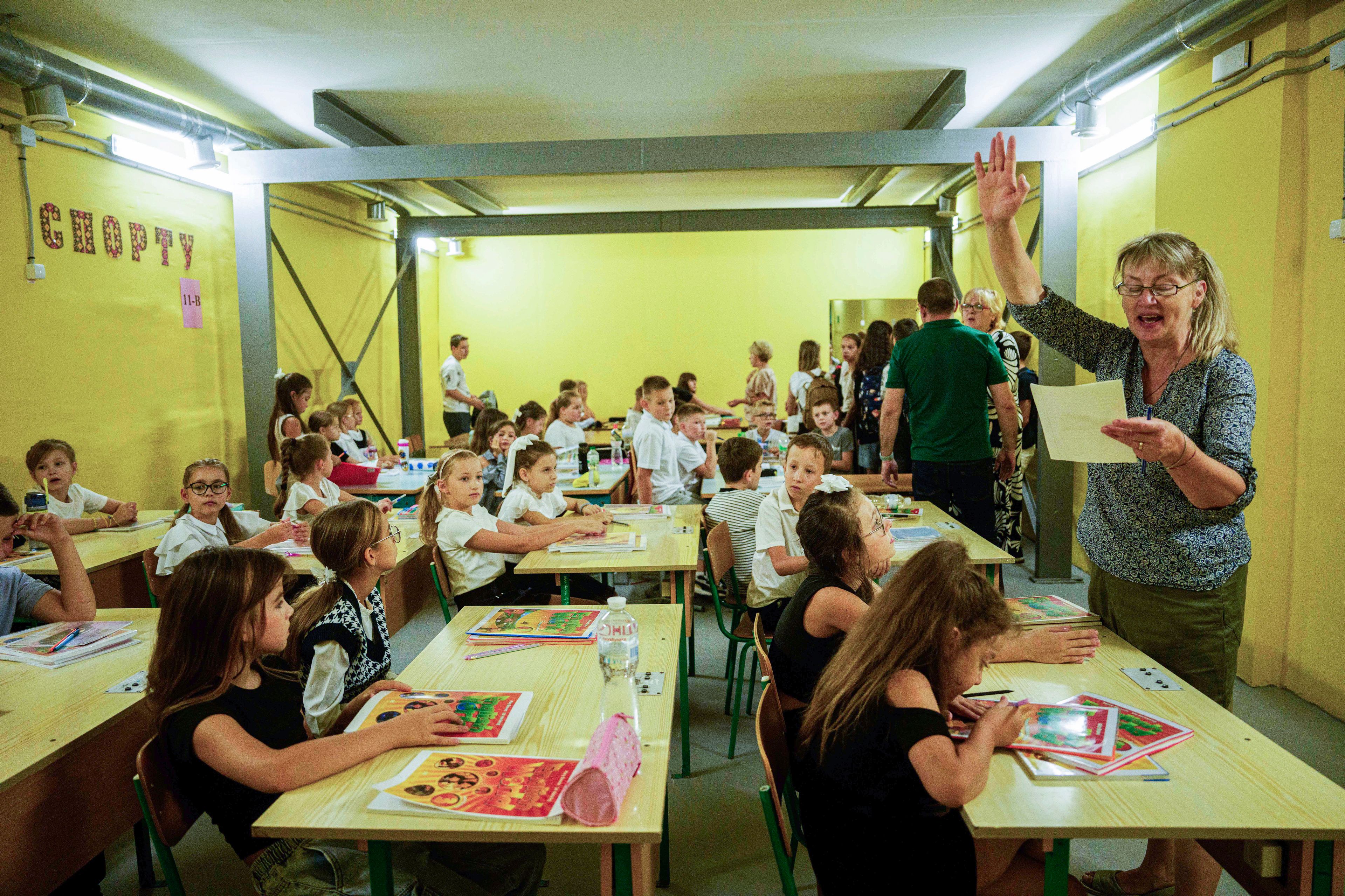 Classes continue underground at Gymnasium No. 6 despite an air alert in Zaporizhzhia, Ukraine, Sept. 3, 2024. Missiles and bombs strike daily, so the city has begun on a dozen subterranean schools designed to be radiation- and bomb-proof. (AP Photo/Evgeniy Maloletka)