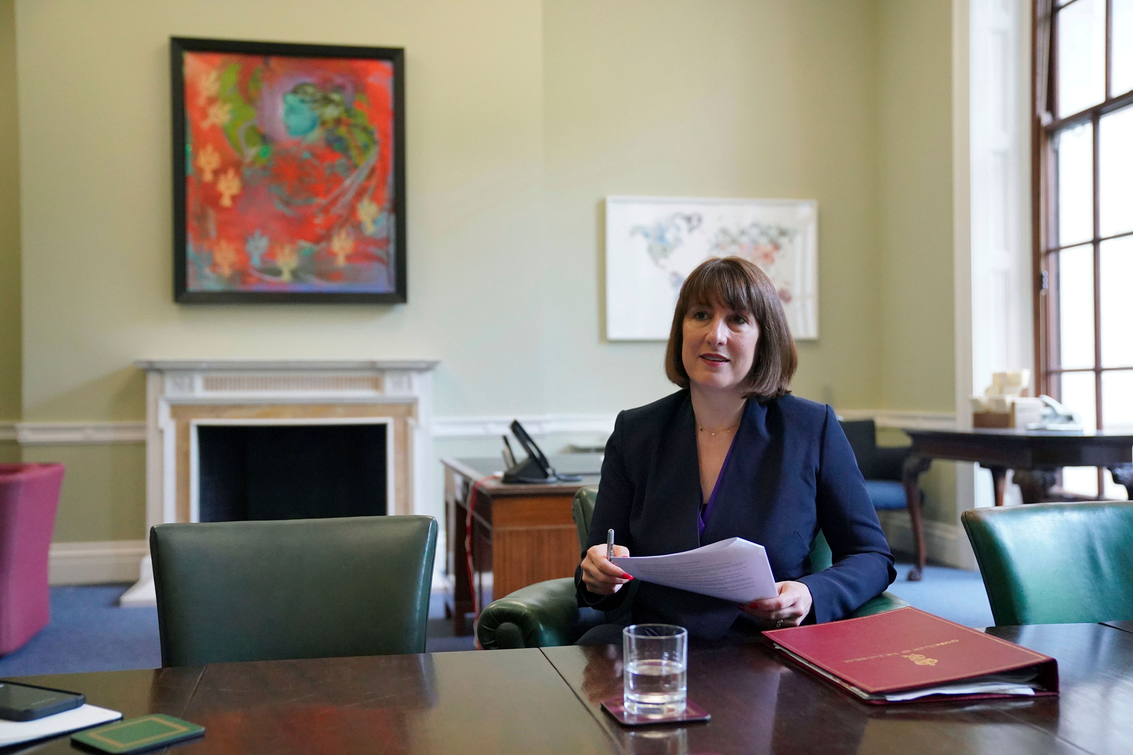 FILE - Britain's Chancellor Rachel Reeves prepares to deliver a speech at the Treasury to an audience of leading business figures and senior stakeholders, announcing the first steps the new government will be taking to deliver economic growth, in London, Monday July 8, 2024. (Jonathan Brady/Pool Photo via AP, File)