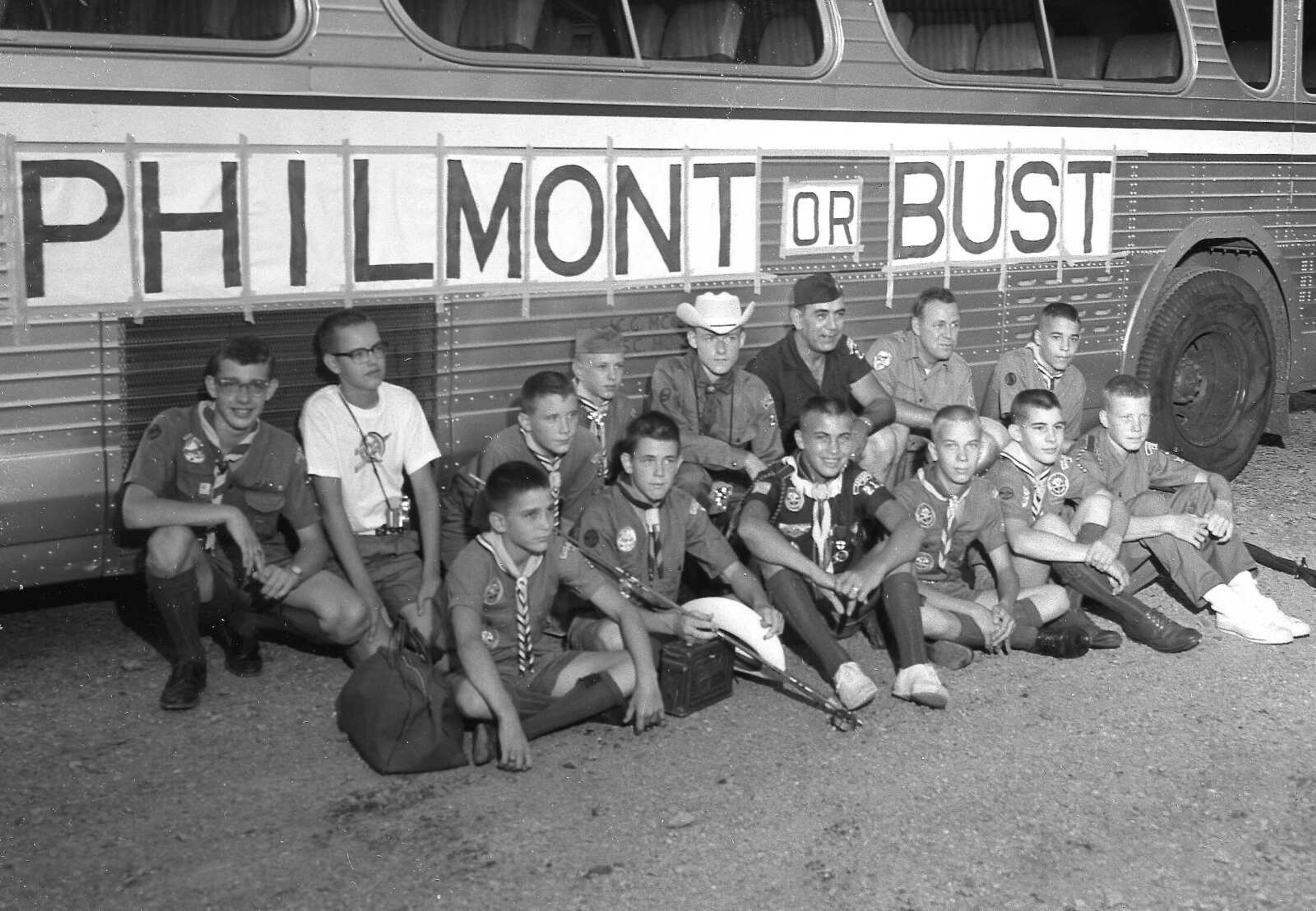 July 29, 1961 Southeast Missourian.
"Bust or not." These local explorers and older scouts left early today for Camp Philmont in New Mexico where they will spend 12 days under rough camping experiences on the open trail. The three day trip will include overnight stops in Wichita, Kansas, and LaJunta, Colorado, where planned activities have been set up. From left to right, front, John D. Finch, Troop 3 of Columbia; Richard Lueders, Reid Carron, Bill Hopkins, Richard Haas, and John Hagans; back row, Ralph E. Frye, John Mueller, Joe Beatty, Robin Erlbacher, Leslie Thomas, L.J. Carron of Jackson, Paul Berkbigler of Cape, head of the trip; and Steve Seabaugh. Hagans and Carron are from Jackson and Hopkins is from Marble Hill. (G.D. Fronabarger/Southeast Missourian archive)