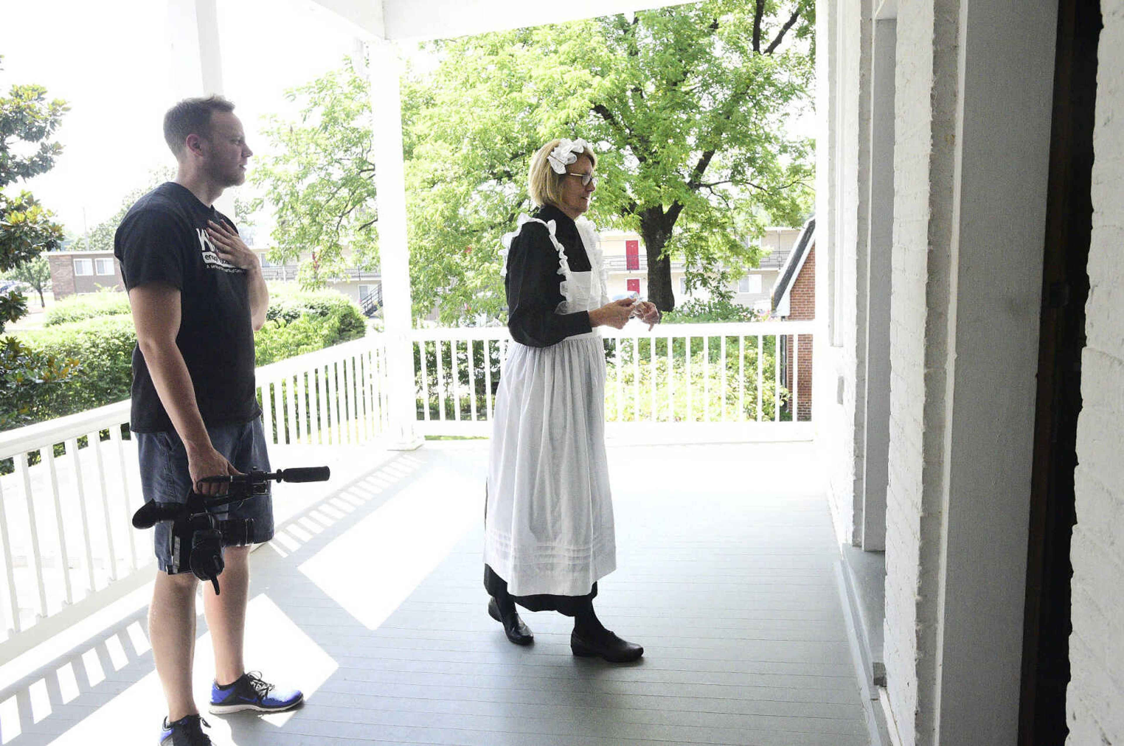 Eric Boedeker from KMOS-TV prepares to film Linda Ingram inside the servant's quarters on Wednesday, Aug. 16, 2017, at the Glenn House in Cape Girardeau. KMOS-TV, a PBS affiliate, was filming inside the historic home for its Missouri Life show.