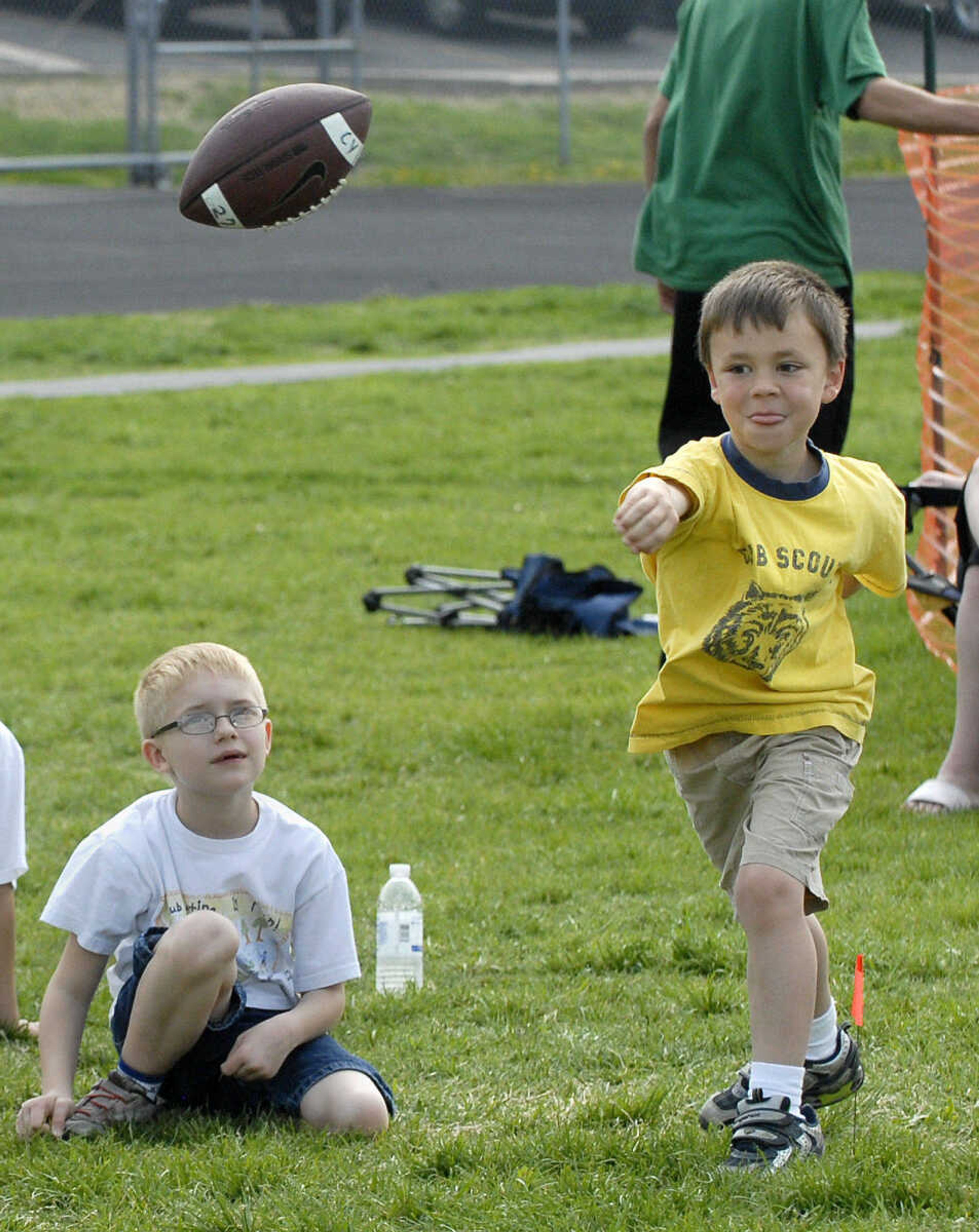 LAURA SIMON~lsimon@semissourian.com
Nick Hodges takes a shot at the target during the football toss Sunday, April 10, 2011 during the Cub Scout track and field day at Cape Central Junior High in Cape Girardeau.