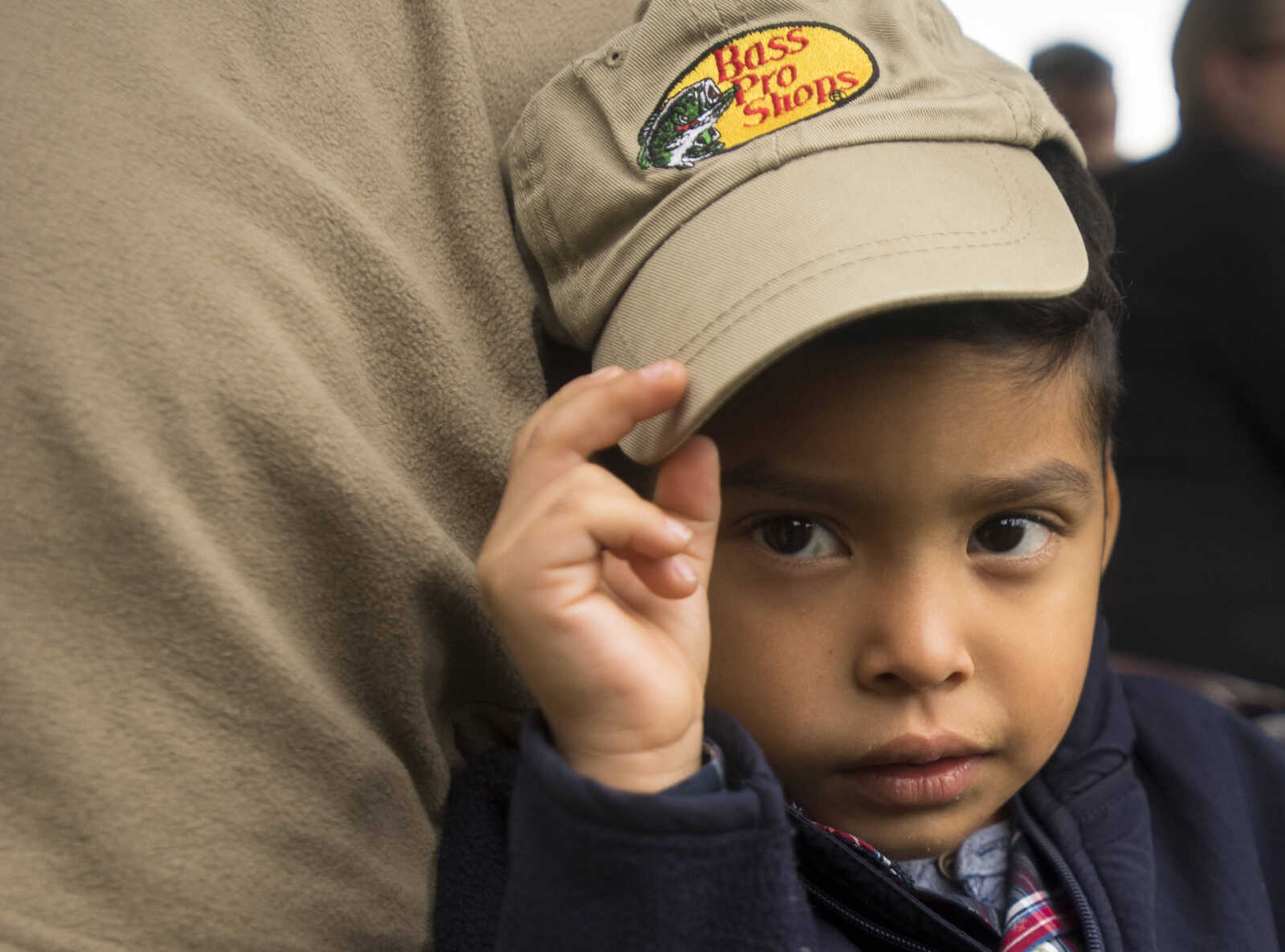 Mateo Mondragon, 4, waits at the registration area during the inaugural Fishing Rodeo held Oct. 15, 2017 at Elks Lake in Cape Girardeau.