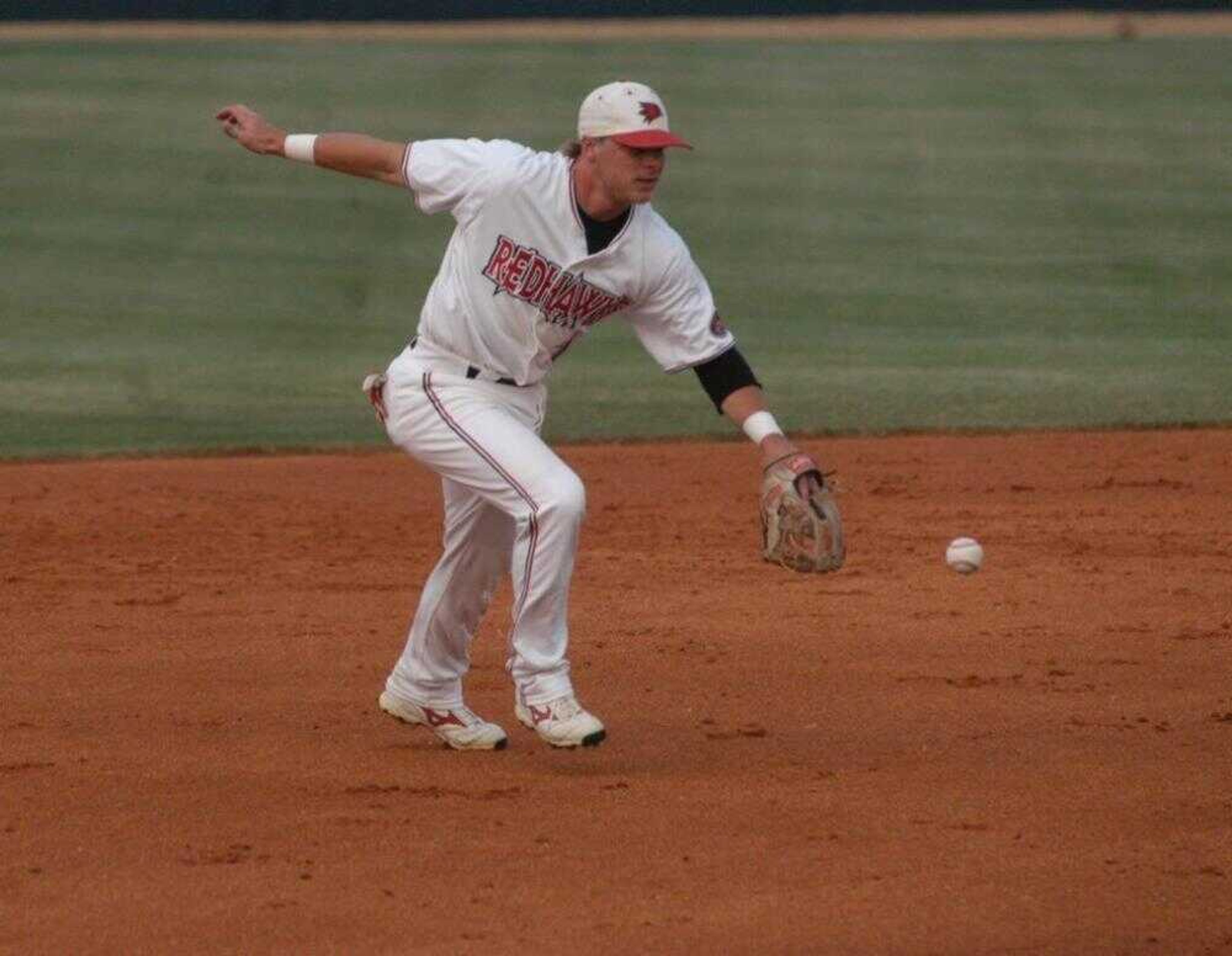 Southeast shortstop Robby Moore tried to field a ground ball during the Redhawks' Ohio Valley Conference game against Murray State on Wednesday in Paducah, Ky. (Steve Millizer ~ Paducah Sun)