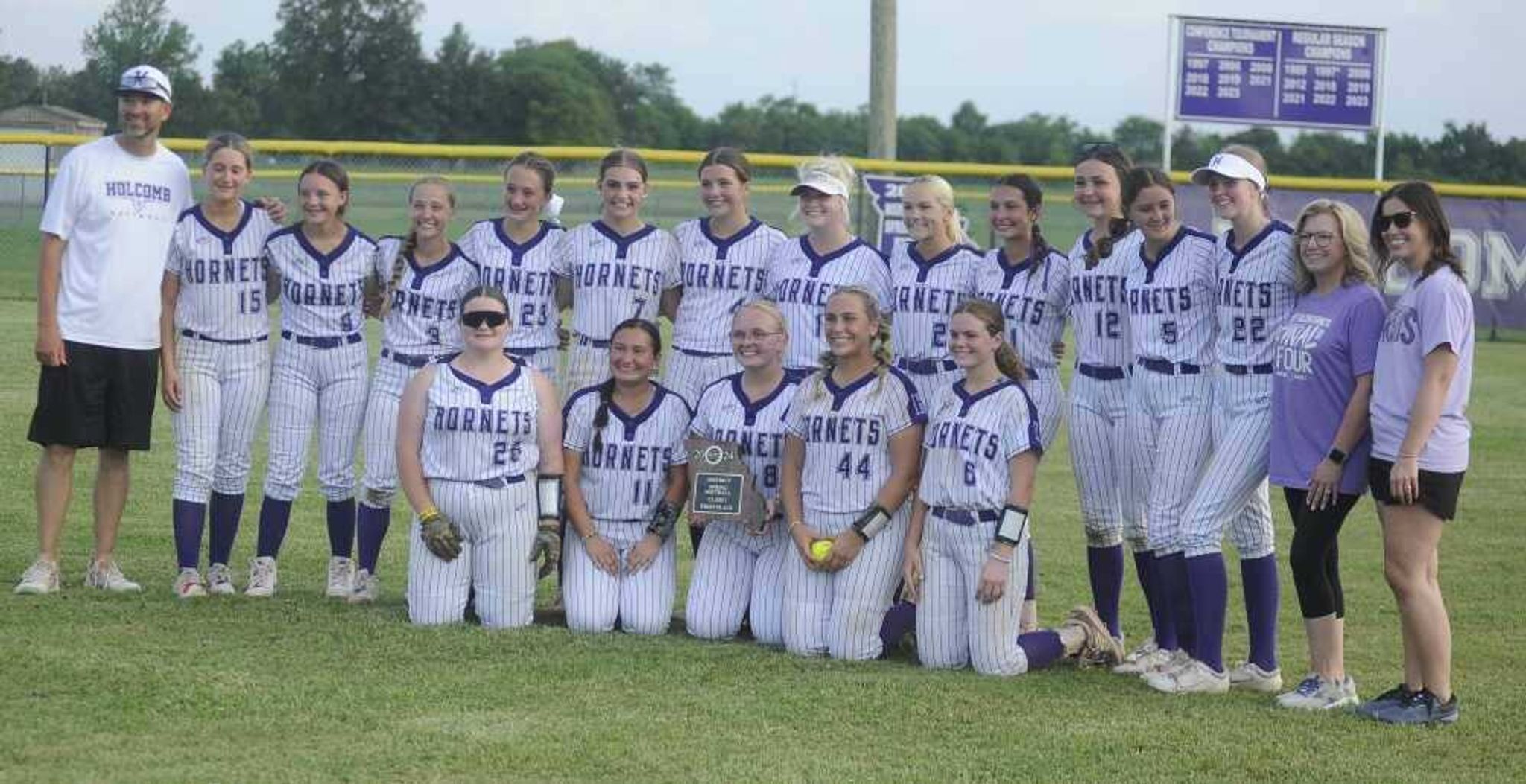 The Holcomb Lady Hornets on the way to the State Quarterfinal round Wednesday against Advance with Bell City at Advance.