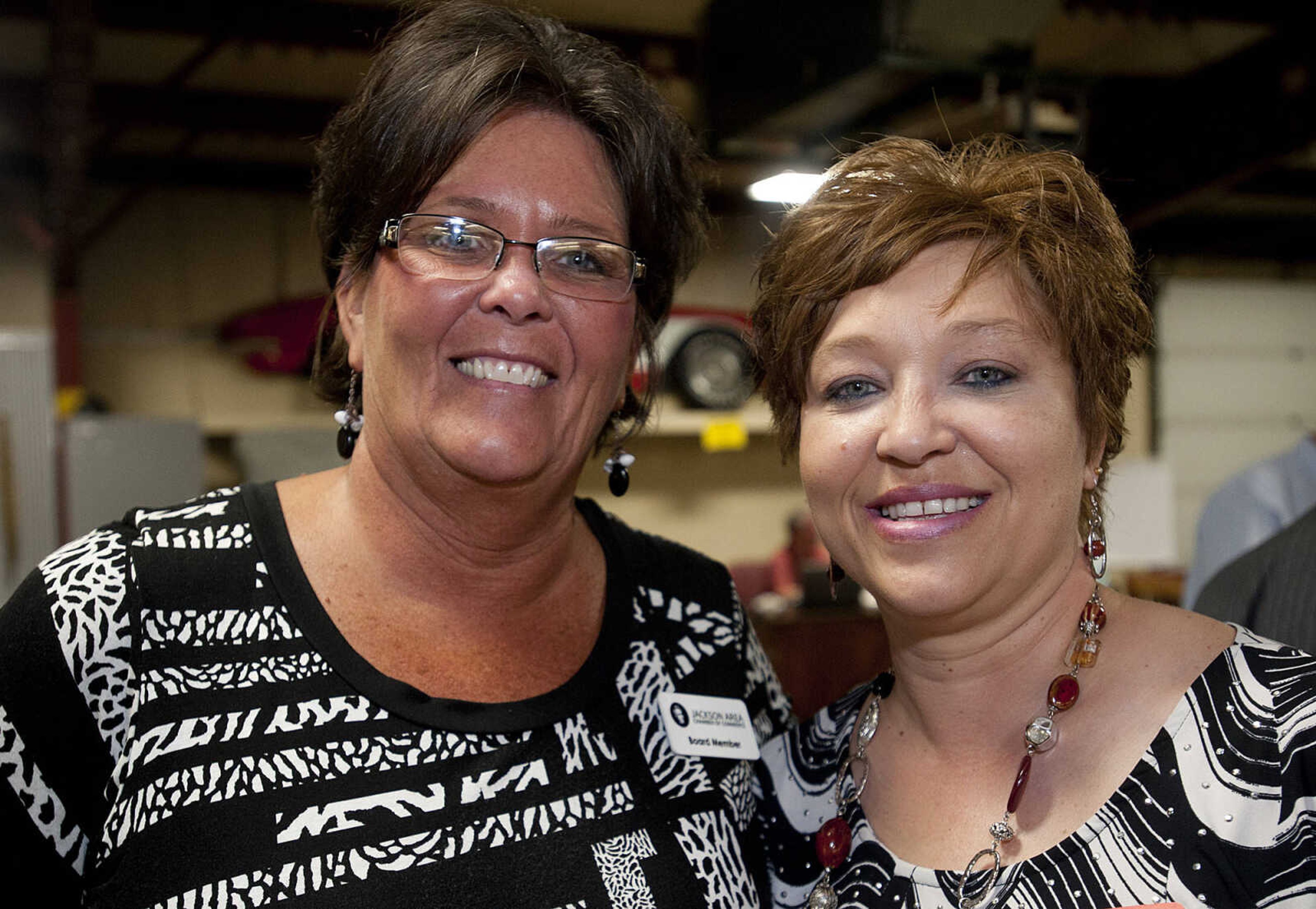 Connie Werner, left, Montgomery Bank, and Barb Bauknecht, First Auto Credit, during the Jackson Area Chamber of Commerce's After Hours event Tuesday, May 13,  at First Auto Credit in Jackson, Mo.