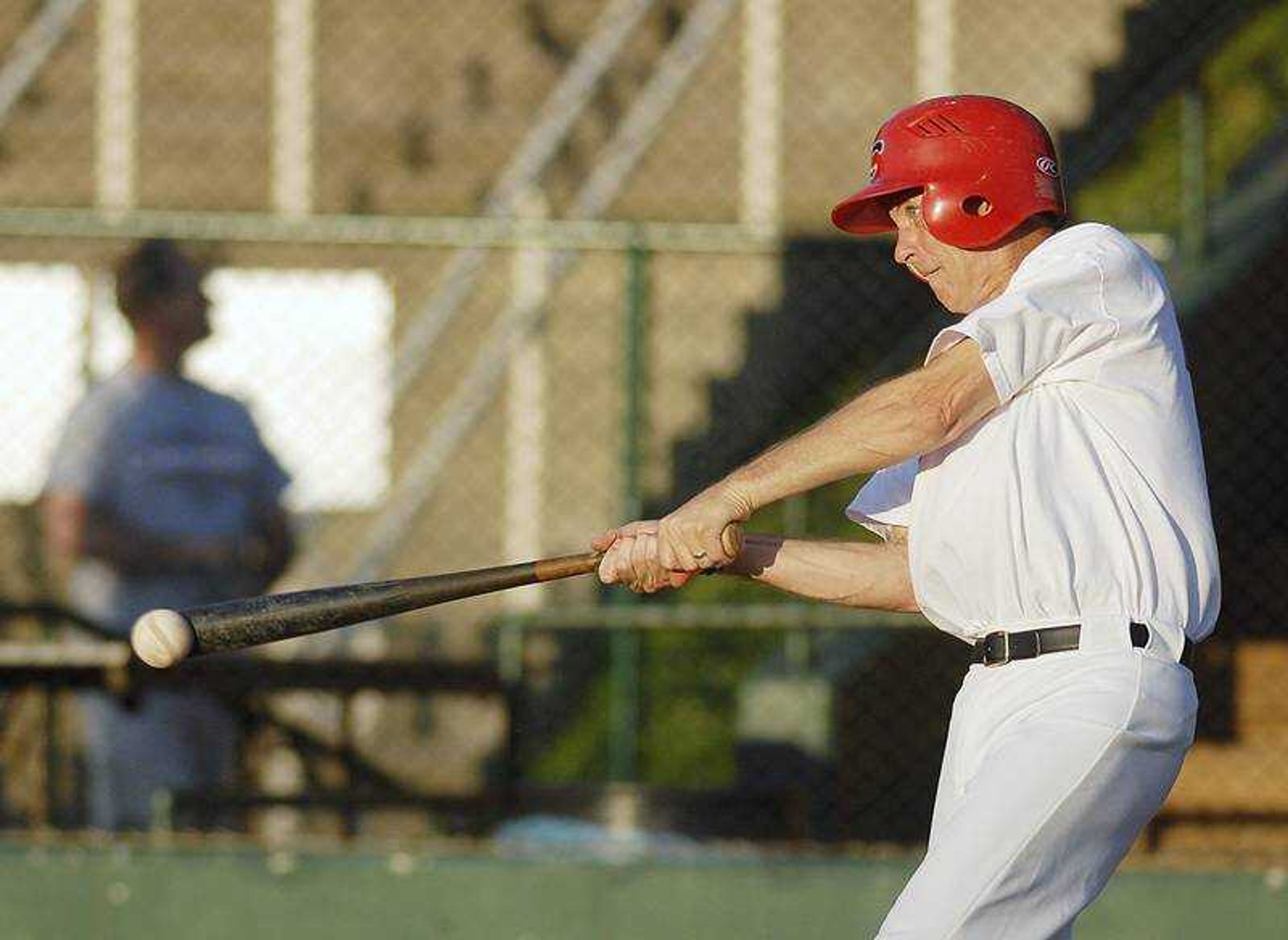 Former Capahas player Rick Weiser connected with the ball during Saturday's game.