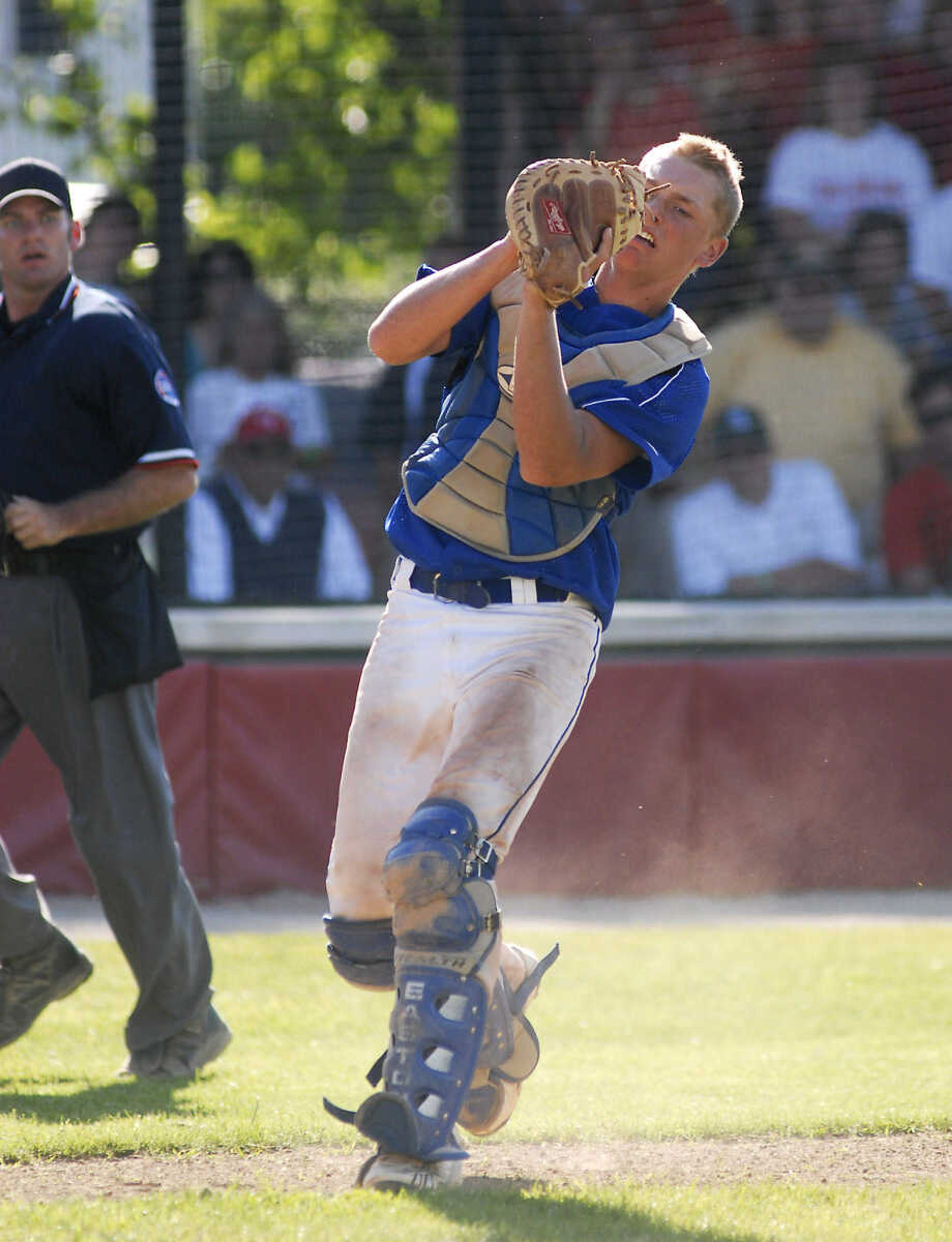 JUSTIN KELLEY photo
Notre Dame's Mark Hagedorn catches a pop up in foul territory during the Class 3 championship game Saturday, June, 6 2009, against Carl Junction at Meador Park in Springfield.