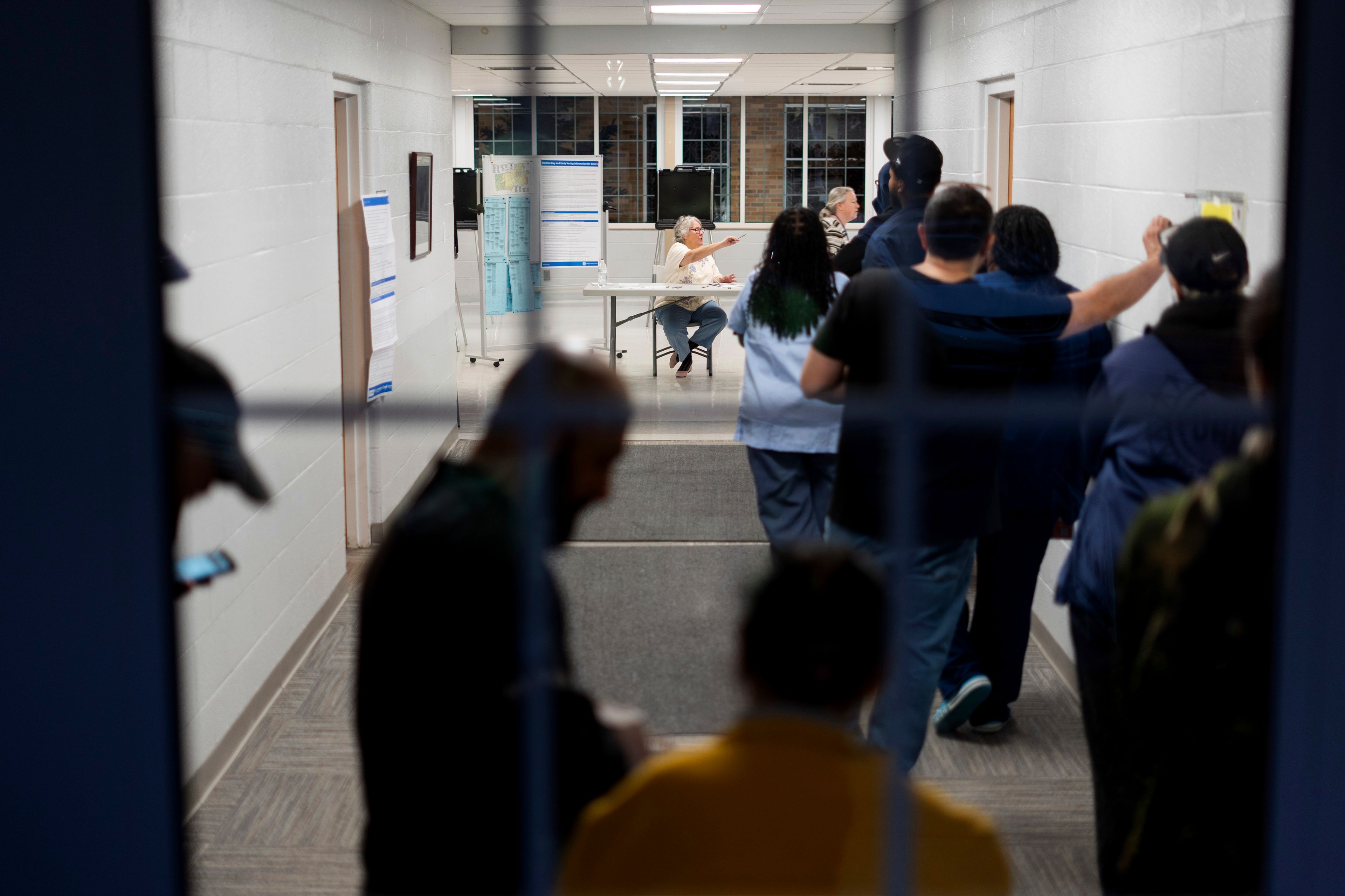 Voters wait in line for the polls to open on Election Day, Tuesday, Nov. 5, 2024, at a polling site in Dearborn, Mich. (AP Photo/David Goldman)