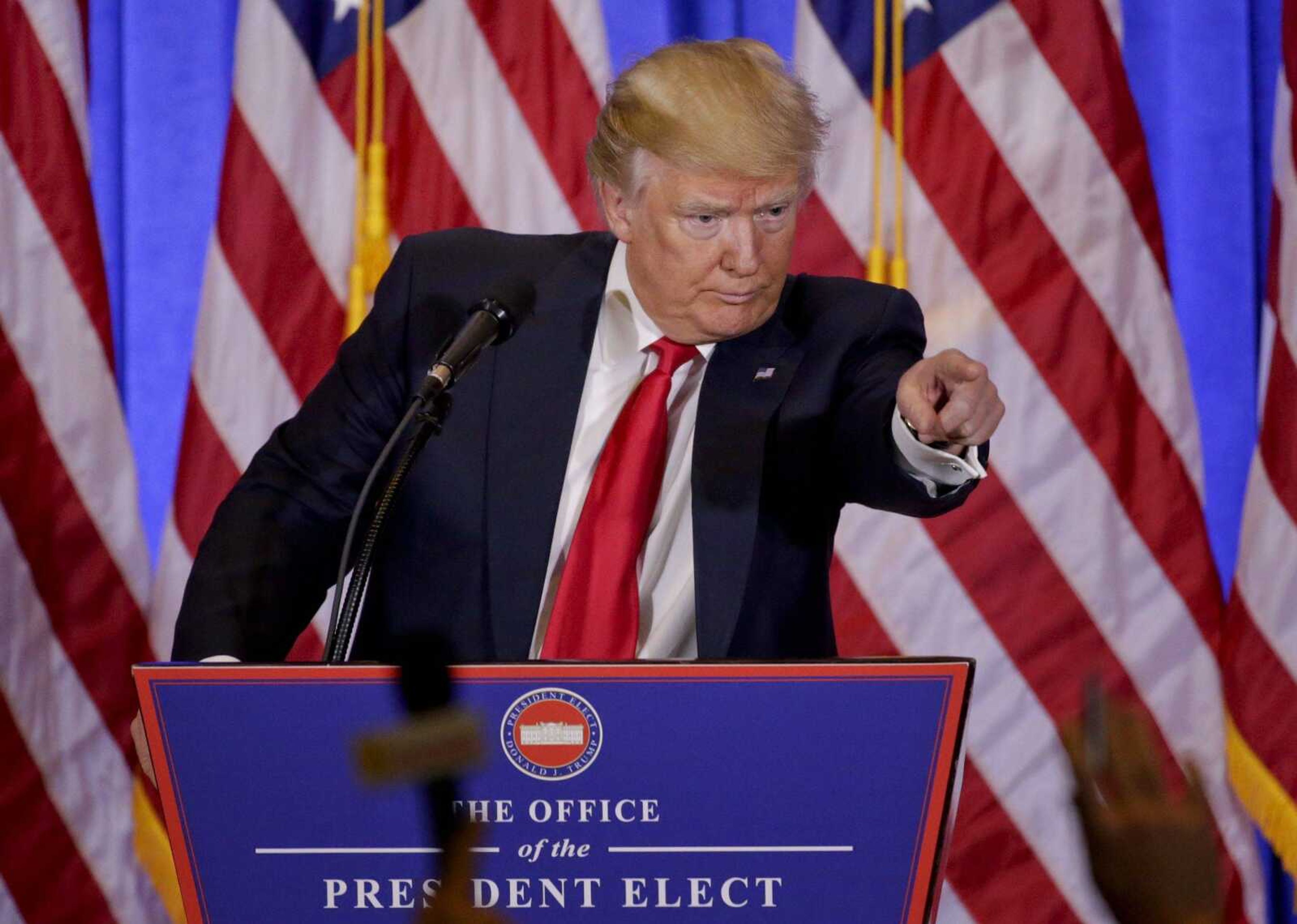 President-elect Donald Trump takes questions during a news conference Wednesday in New York. The news conference was his first as president-elect.