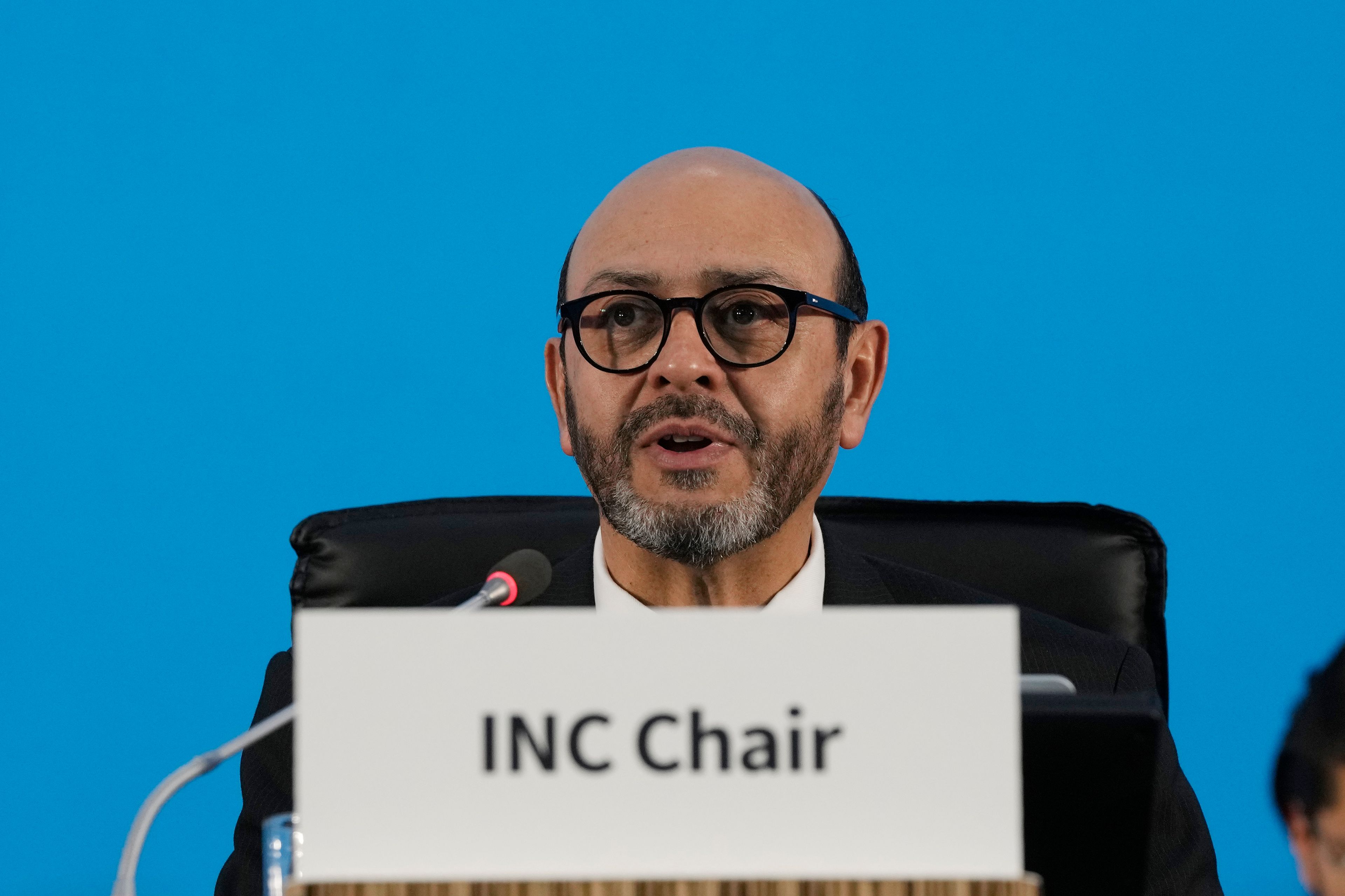 Chair of the International Negotiating Committee Luis Vayas Valdivieso speaks during the start of a plenary of the fifth session of the Intergovernmental Negotiating Committee on Plastic Pollution in Busan, South Korea, Sunday, Dec. 1, 2024. (AP Photo/Ahn Young-joon)