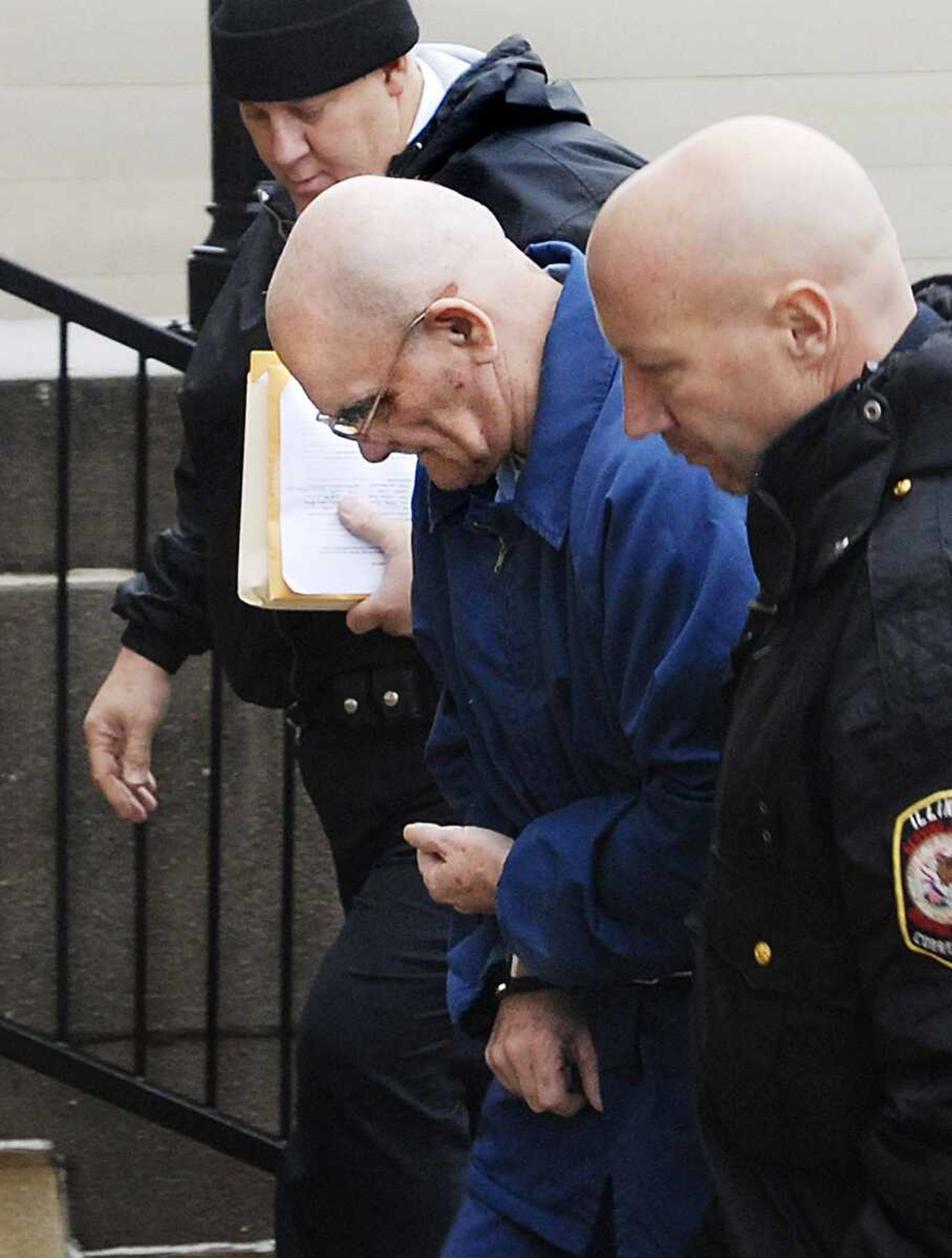 Timothy W. Krajcir is escorted by Illinois Department of Corrections officers into the Jackson County Courthouse in Murphysboro, Ill. to enter his plea on charges of the 1982 murder of Debbie Sheppard on Monday, December 10, 2007. (Aaron Eisenhauer)