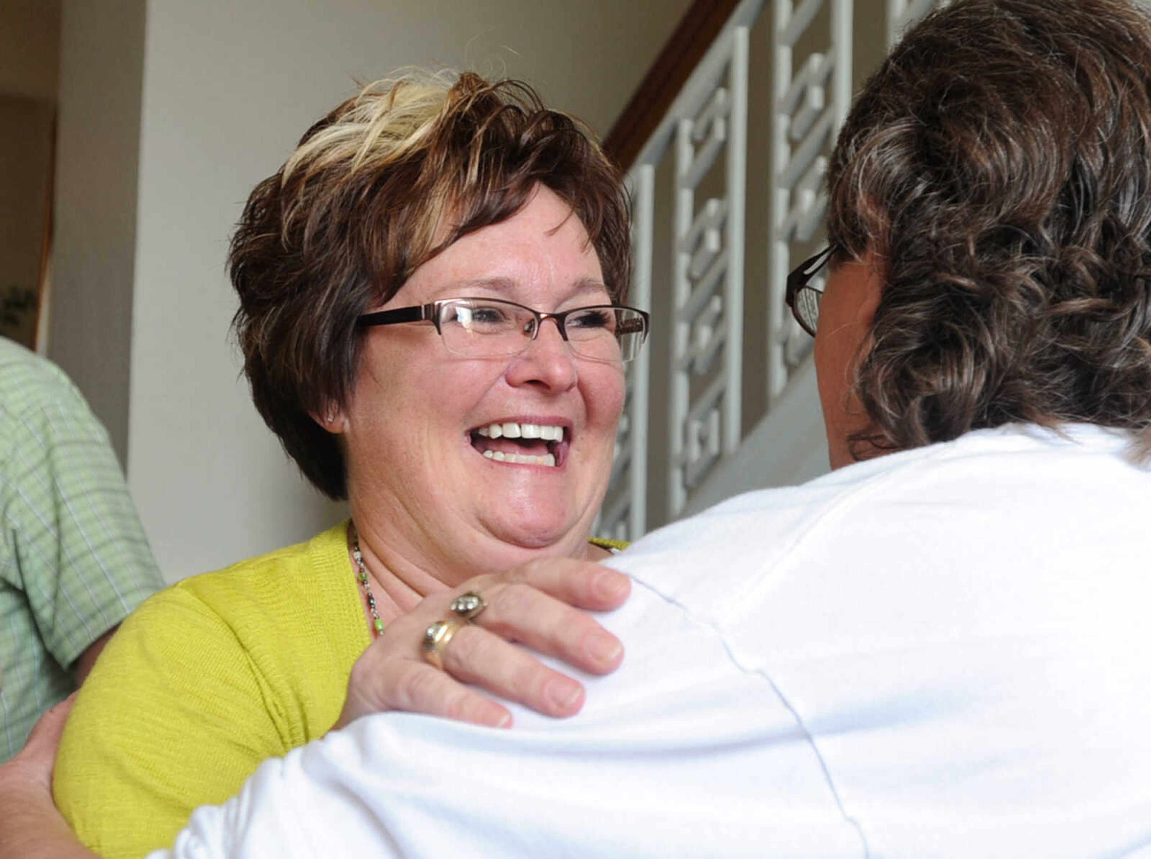 LAURA SIMON ~ lsimon@semissourian.com
Cheryl Brenneke hugs Wendi Bird Barnhart Thursday, June 6, 2013, inside the Cape Girardeau County Courthouse. Clay Waller pleaded guilty to second-degree murder for the death of the Brenneke's sister, Jacque Waller. Jacque Waller went missing June 1, 2011. Her body was found last Wednesday in Southern Illinois.