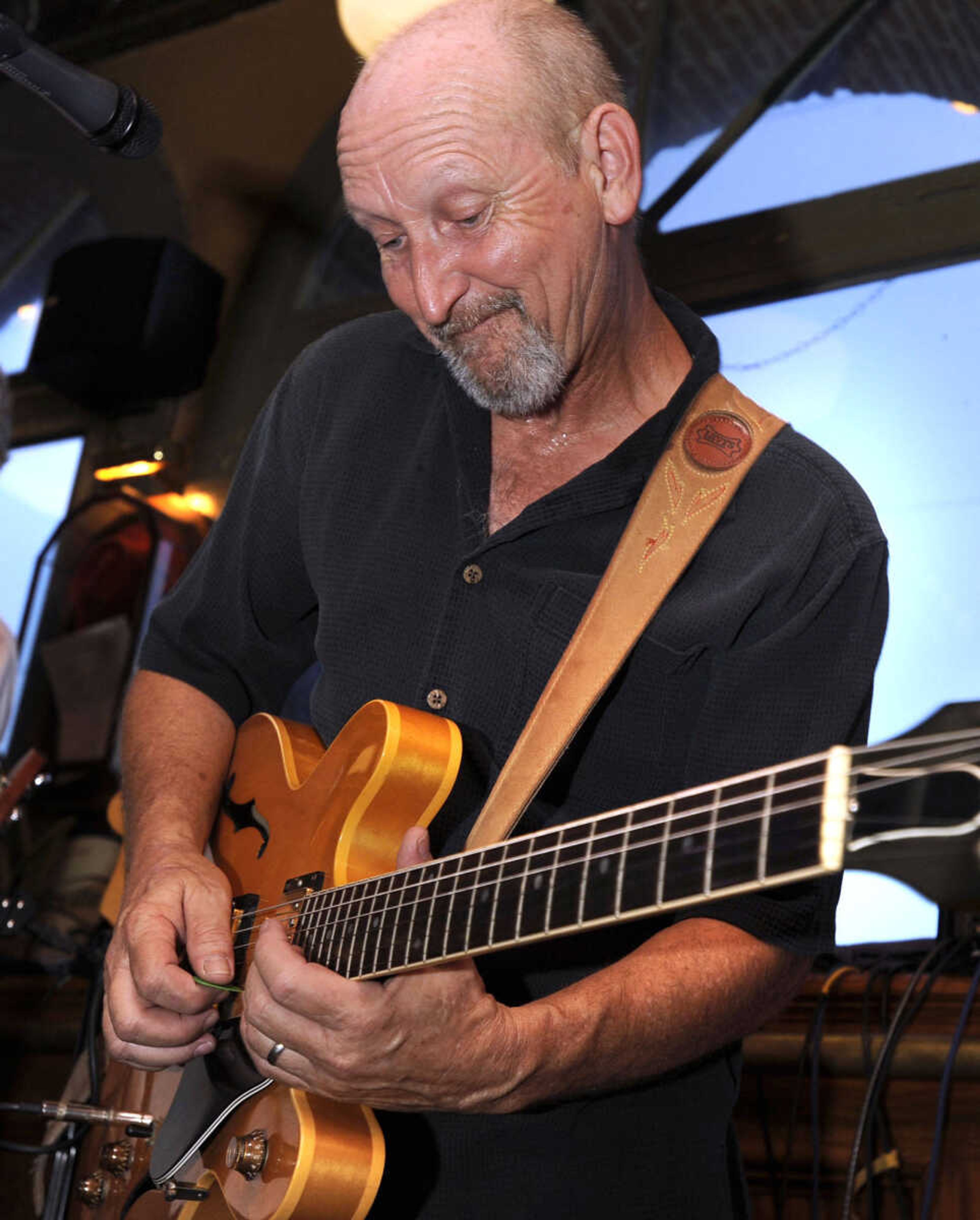 FRED LYNCH ~ flynch@semissourian.com
Bruce Zimmerman plays blues with the Water Street Band at Port Cape Girardeau Sunday, July 12, 2015 in Cape Girardeau.