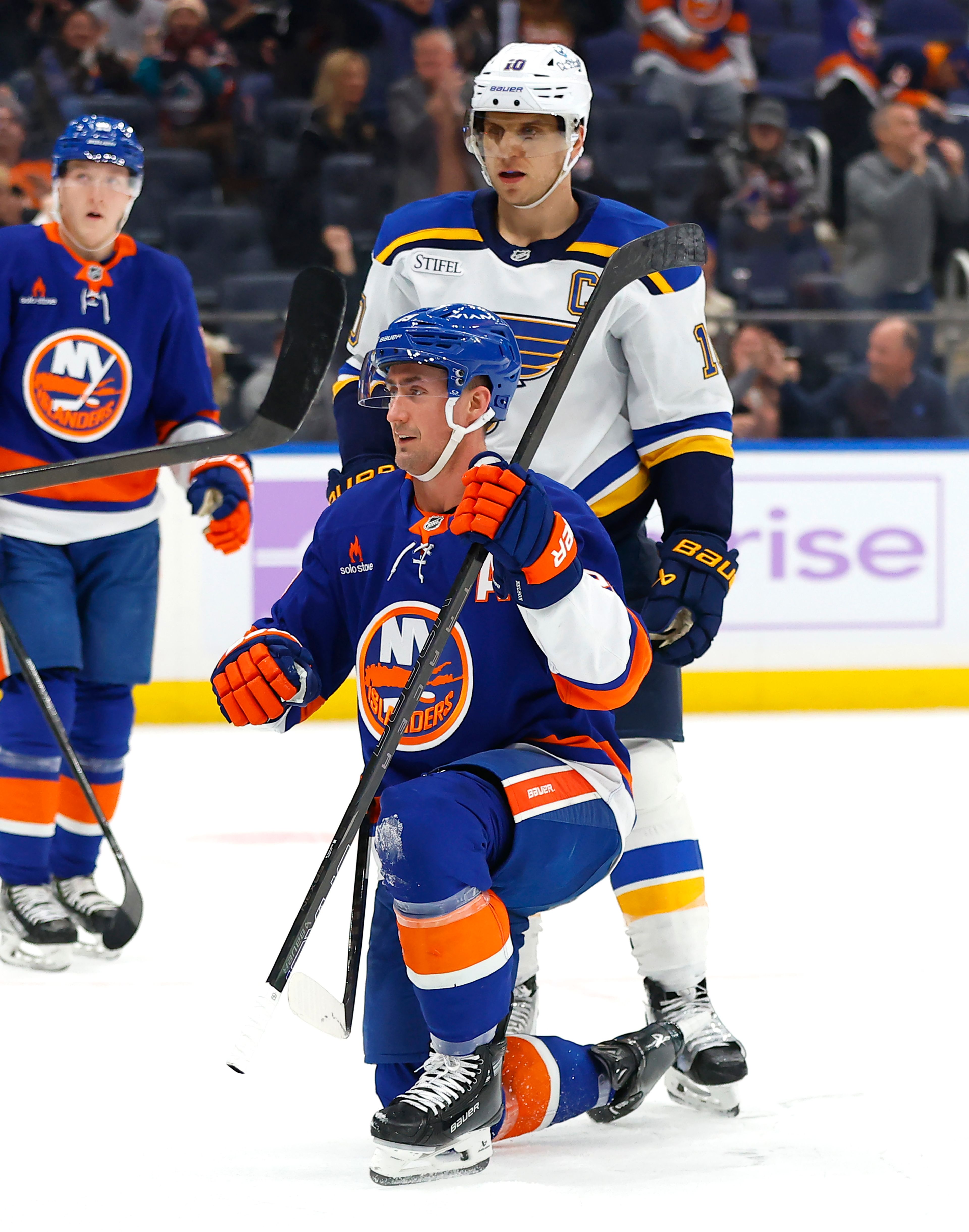 New York Islanders center Brock Nelson (29) reacts after scoring a goal in front of St. Louis Blues center Brayden Schenn (10) during the second period of an NHL hockey game, Saturday, Nov. 23, 2024, in New York. (AP Photo/Noah K. Murray)