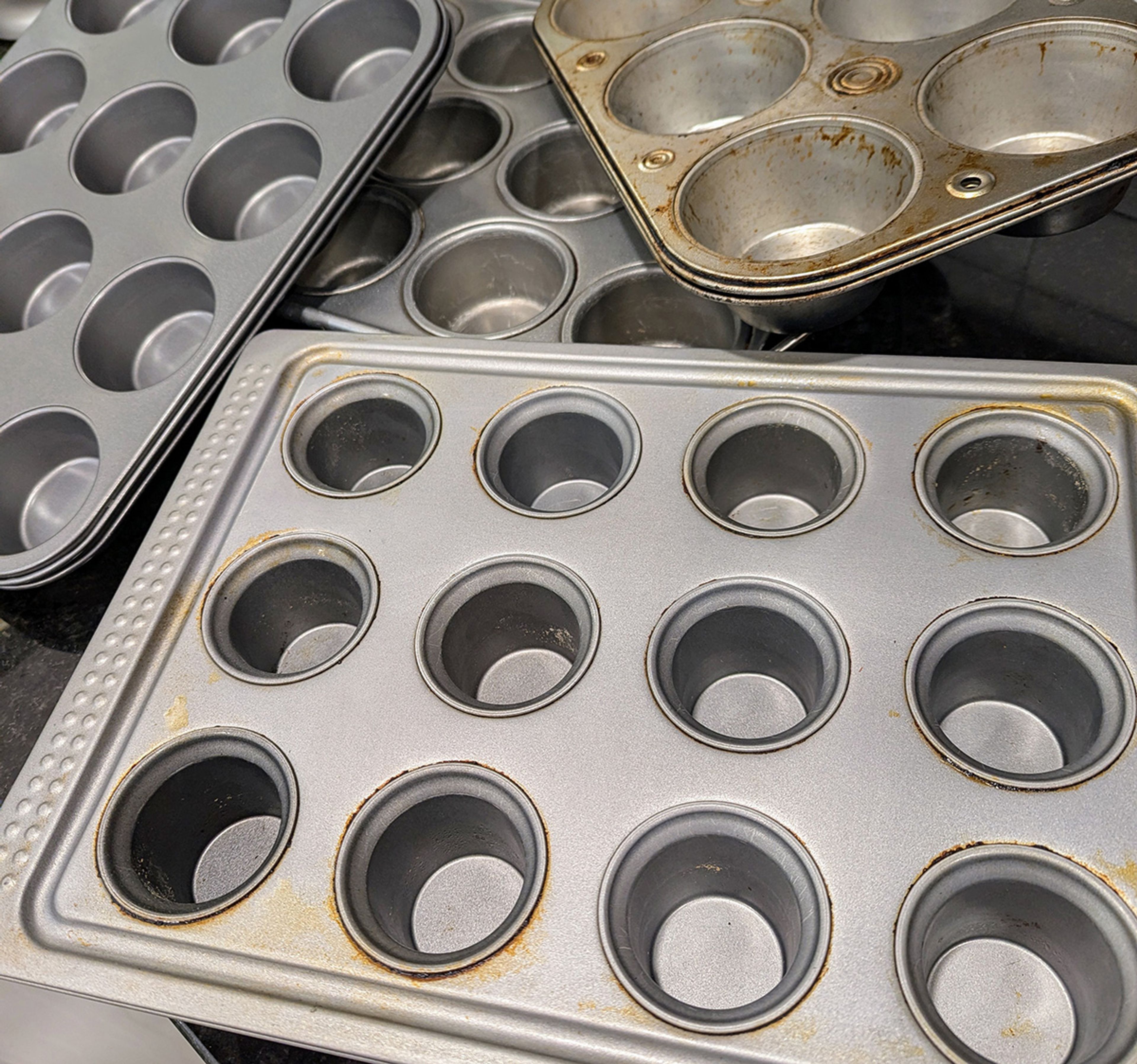 Invented at the turn of the 20th century, the muffin pan has gone on to serve many uses besides baking muffins, not the least of which is as an alternative to the cookie sheet.
