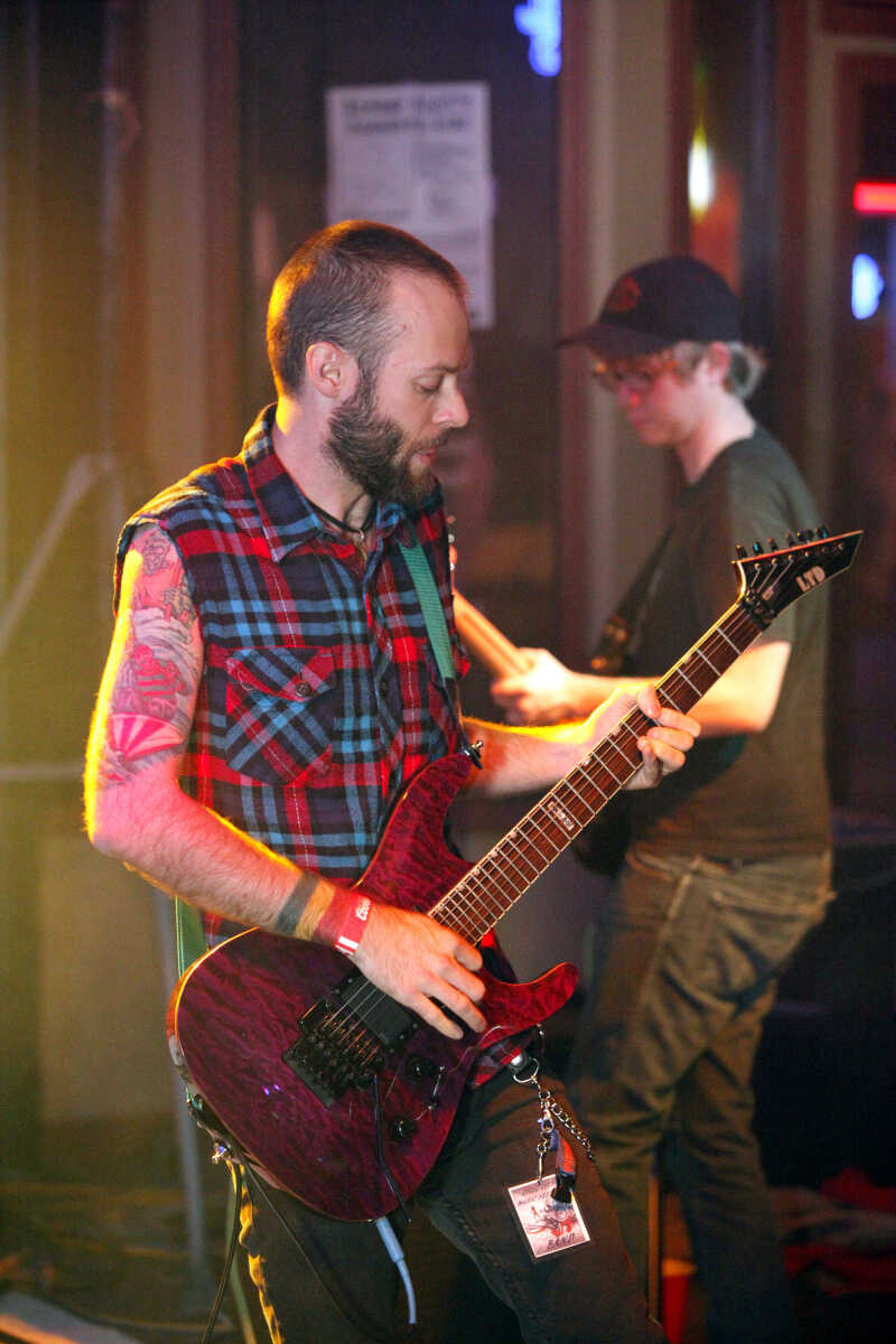 CHRIS MACKLER ~ photos@semissourian.com

Nathan Comer, of the band Guy Morgan & the FT Crew, performs at Breakaway's during the 14th annual River City Music Festival held in downtown Cape Girardeau on Friday, Oct. 1, 2010.