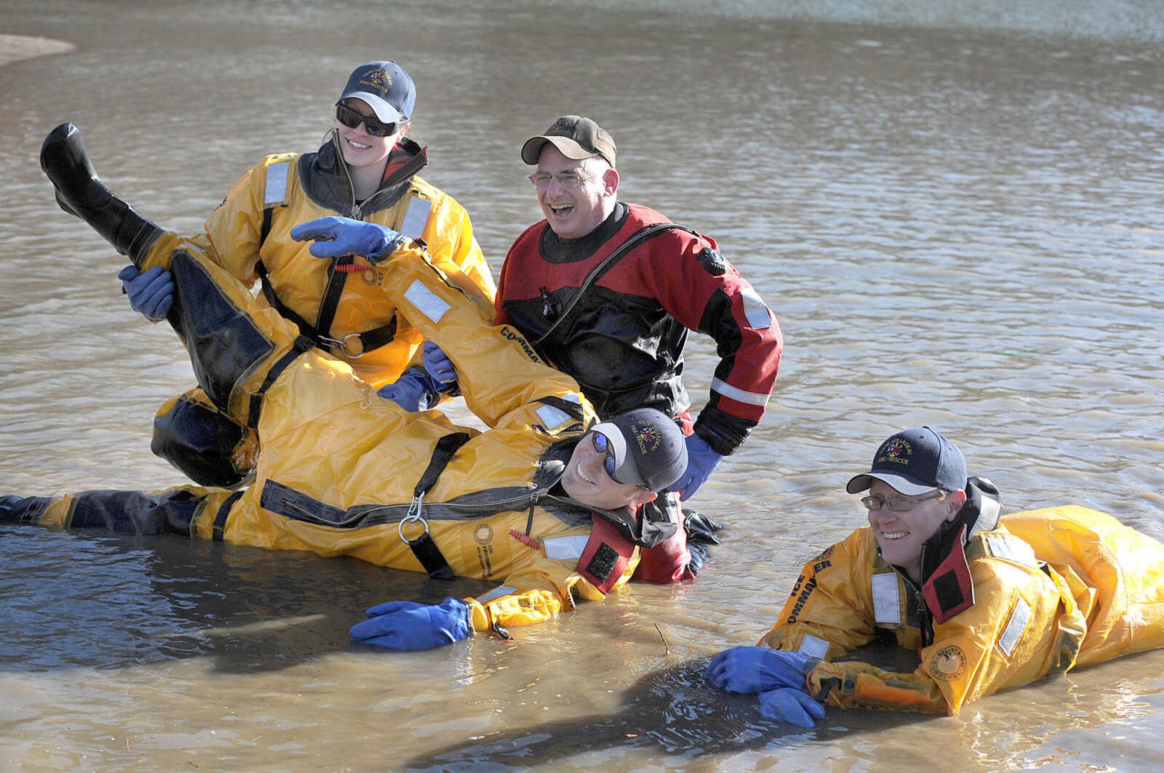 LAURA SIMON ~ lsimon@semissourian.com
People plunge into the cold waters of Lake Boutin Saturday afternoon, Feb. 2, 2013 during the Polar Plunge at Trail of Tears State Park. Thirty-six teams totaling 291 people took the annual plunge that benefits Special Olympics Missouri.