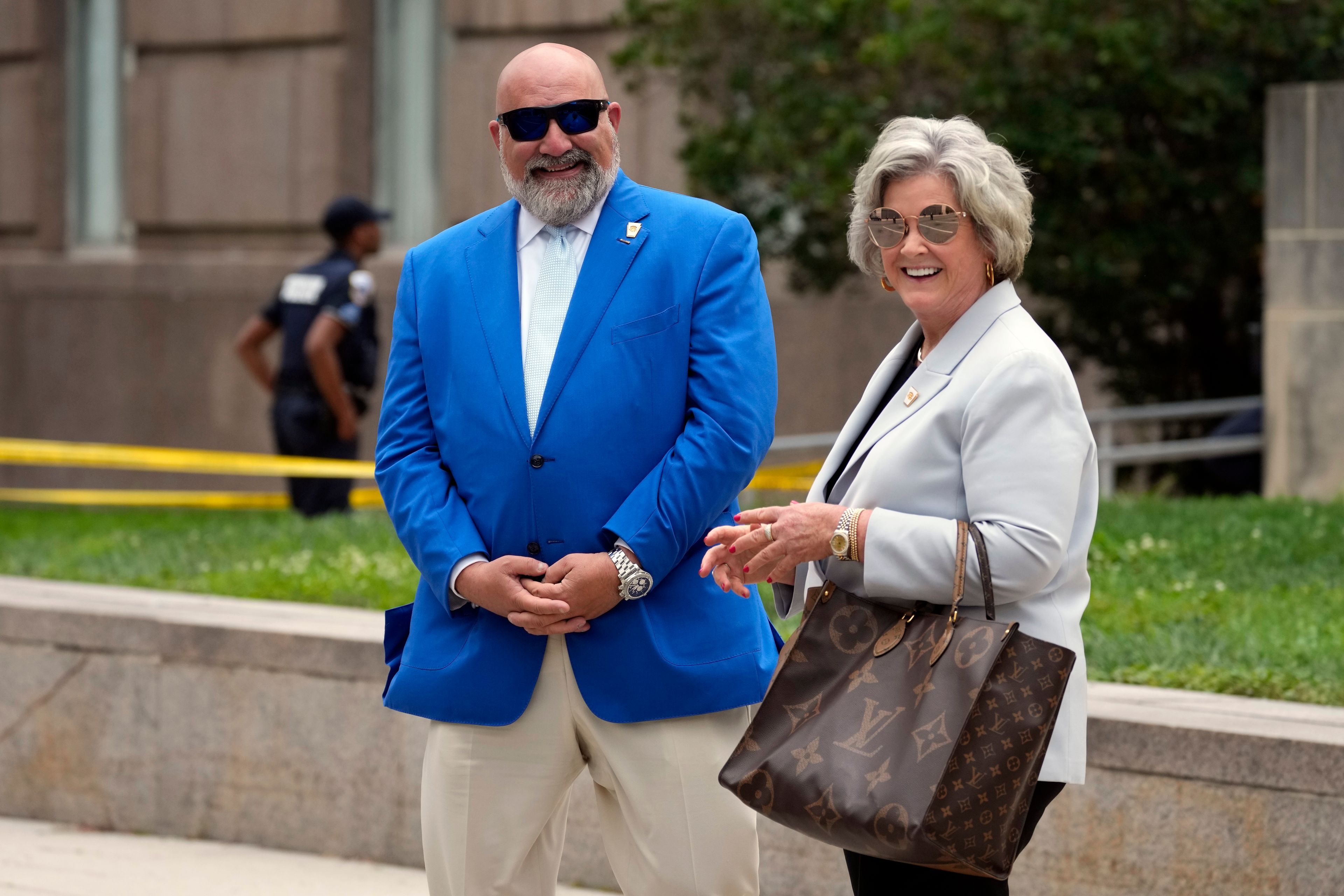 Senior strategist's for former President Donald Trump, Chris LaCivita and Susie Wiles stand outside after Trump arrived at the E. Barrett Prettyman U.S. Federal Courthouse, Aug. 3, 2023, in Washington, to face a judge on federal conspiracy charges alleging Trump conspired to subvert the 2020 election. (AP Photo/Alex Brandon, File)