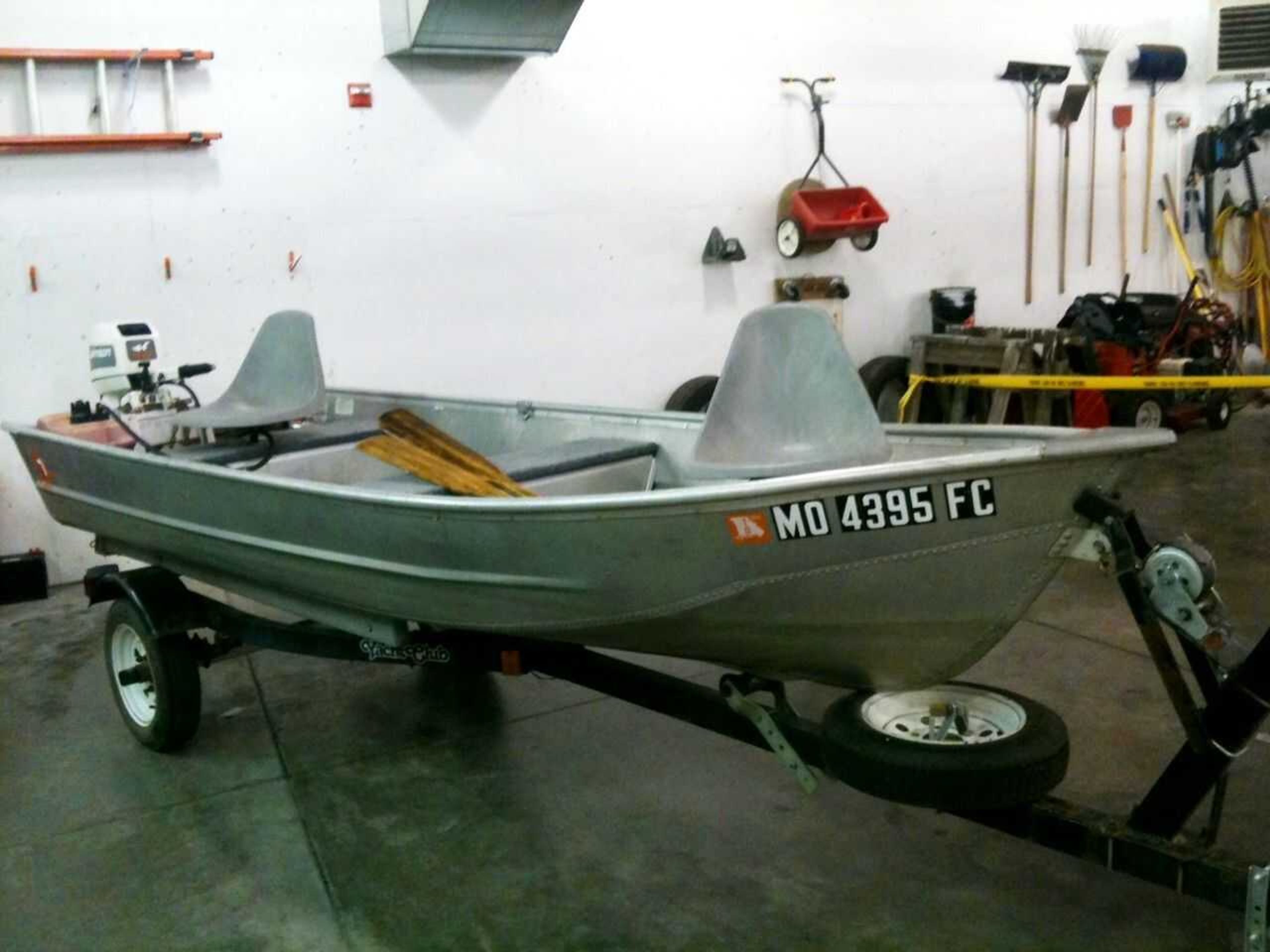 A boat sits in a garage at the Cape Giradeau Sheriff's Department in Jackson Friday, June 3, 2011. Investigators searched the boat after it was seized in connection with the disappearance of Jacque Sue Waller, who went missing Wednesday. (Erin Hevern)