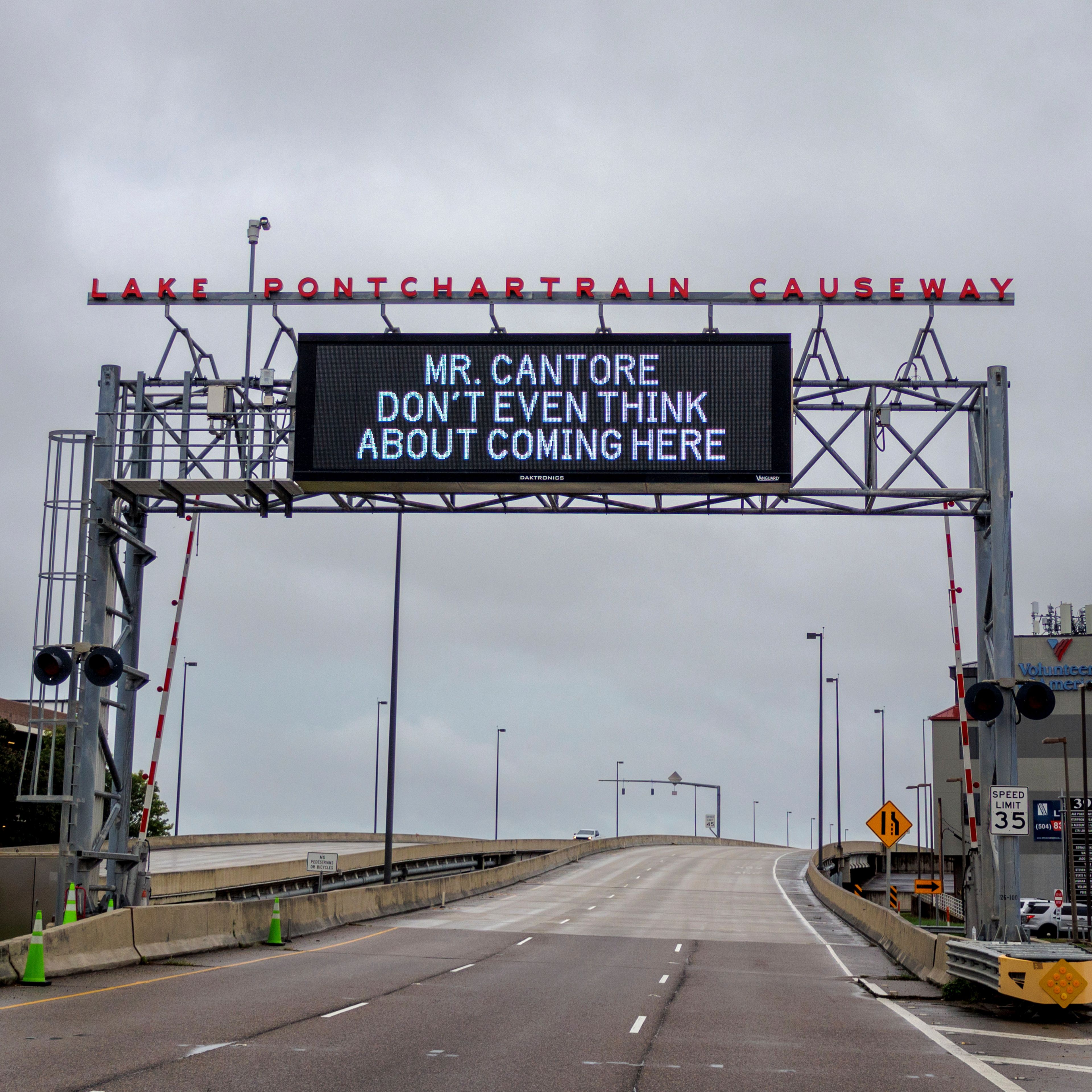 A message aimed at The Weather Channel's meteorologist Jim Cantore is displayed on the message board at the Lake Pontchartrain Causeway near New Orleans as the region prepares for Tropical Storm Francine Tuesday, Sept. 10, 2024. (David Grunfeld/The Times-Picayune/The New Orleans Advocate via AP)