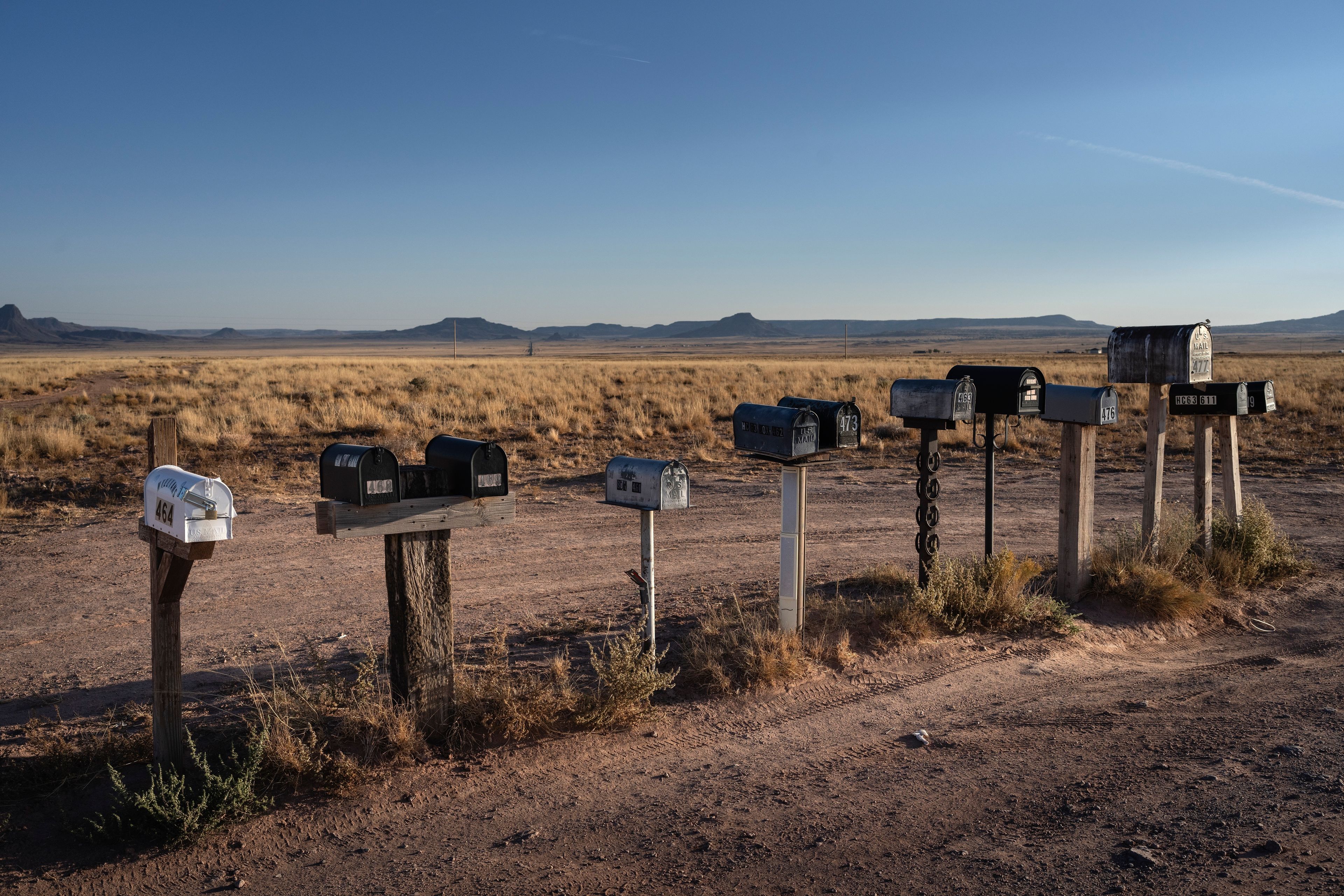 Mail boxes line the side of the road on a rural stretch along Hwy 77, on Arizona's Navajo Nation, Saturday, Oct. 12, 2024.(AP Photo/Rodrigo Abd)