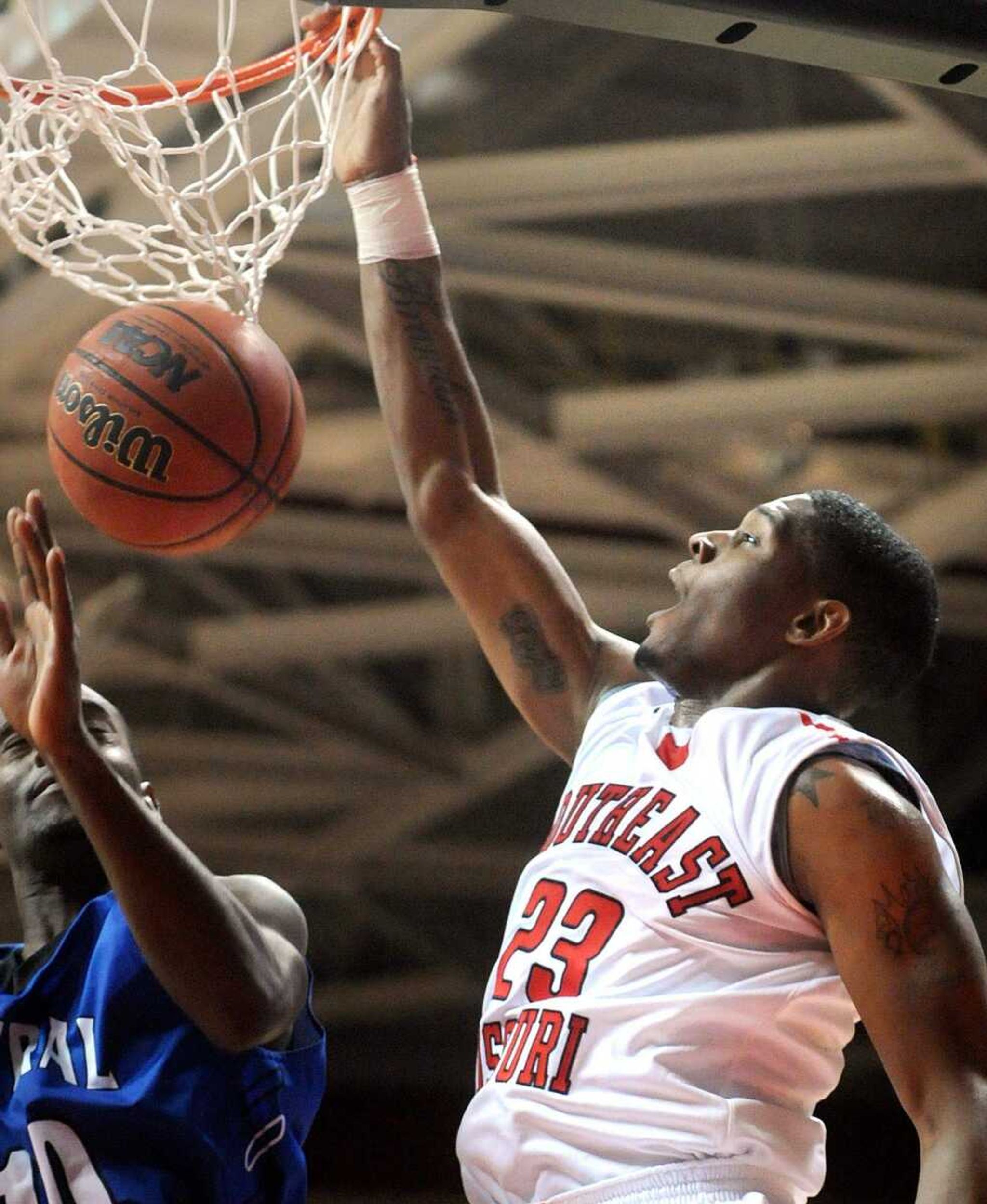 Southeast Missouri State's Jerekious Bradley slam dunks in the first half against Central Baptist College, Monday, Nov. 11, 2013, at the Show Me Center. (Laura Simon)