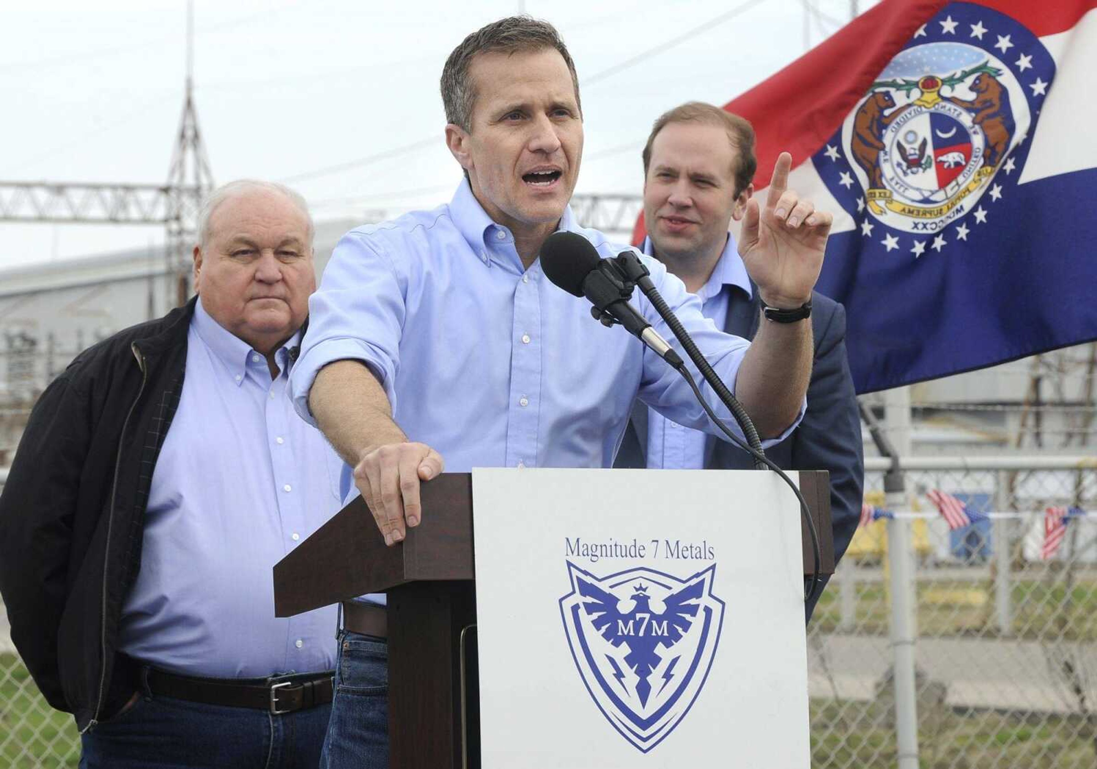 Gov. Eric Greitens speaks Friday as state Rep. Don Rone, left, and U.S. Rep. Jason Smith listen at Magnitude 7 Metals in New Madrid County, Missouri.