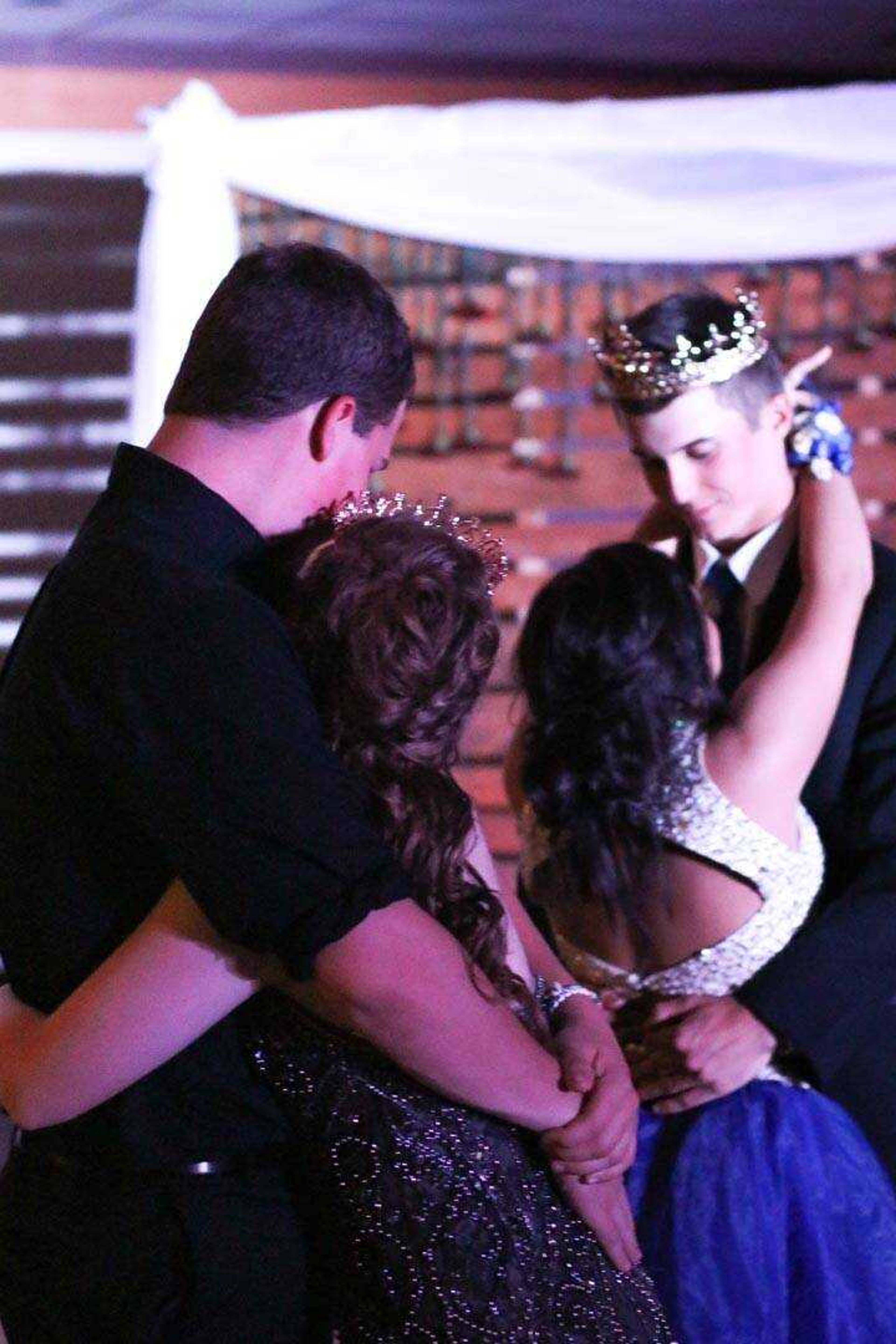 KATE MARSHALL ~ Special to the Southeast Missourian 

Prom king and queen Dalton Boyer and Shelby Page share a dance with their significant other after coronation during the Woodland Prom Saturday, April 13, 2019, at the Southeast Missouri State University Center  in Cape Girardeau .