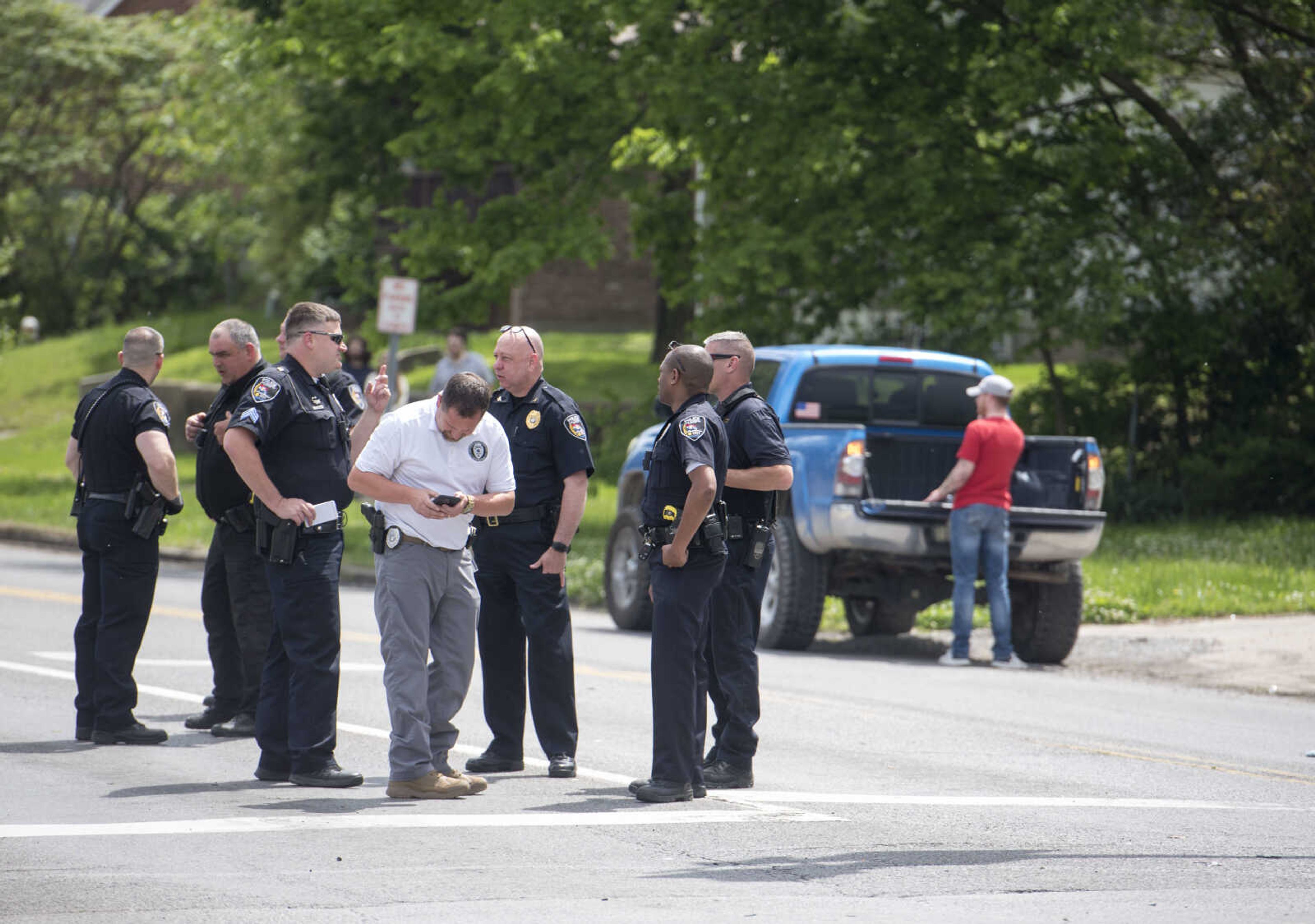 Members of the Cape Girardeau Police Department respond to the scene of a crash near the intersection of William Street and West End Boulevard on Thursday, May 14, 2020. According to Cape Girardeau police Sgt. Joey Hann, both drivers engaged in a verbal altercation. One of the vehicles began to leave the scene as the other driver retrieved a handgun from their vehicle and fired shots at the striking vehicle as it left the scene, Hann stated.