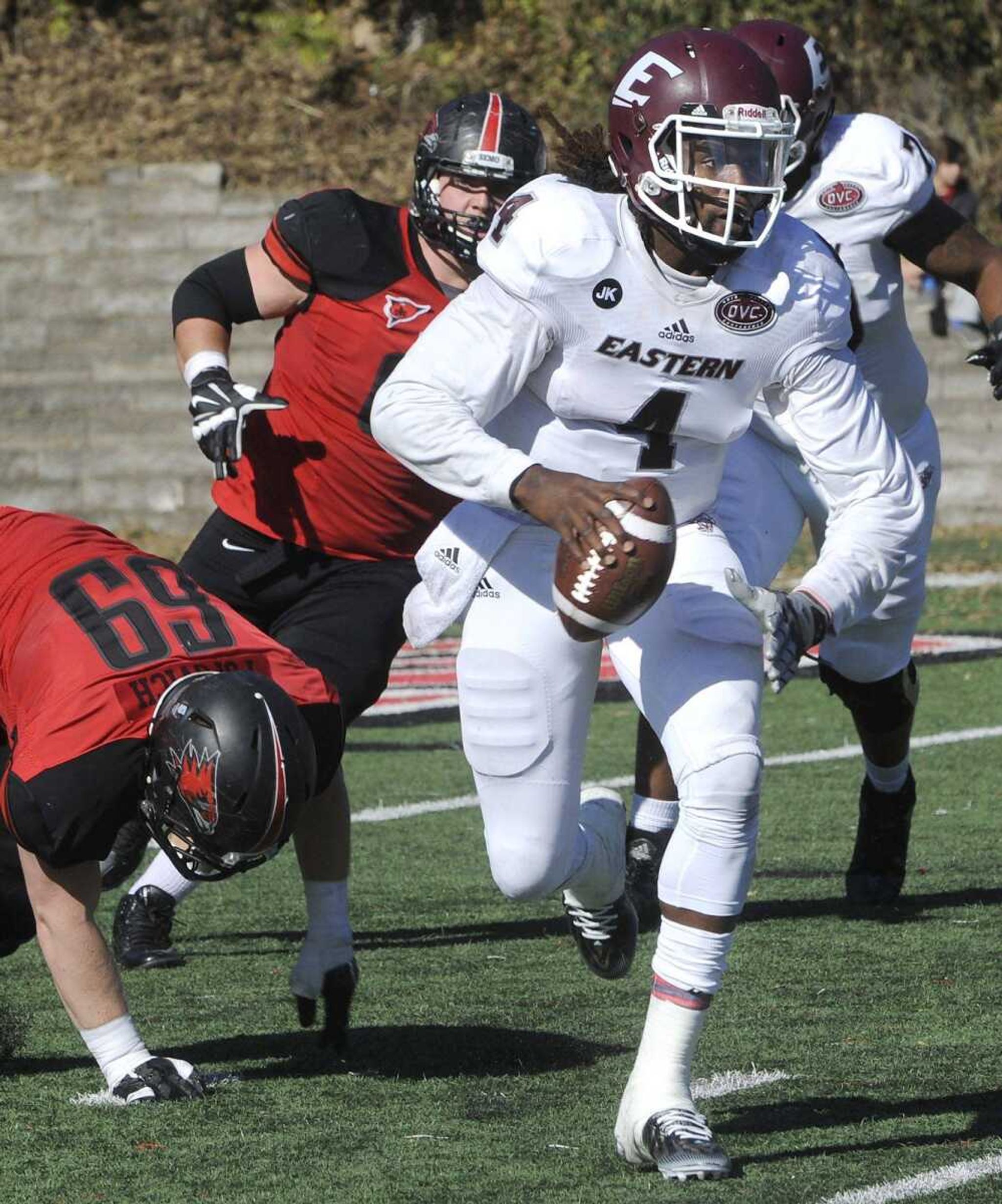 Eastern Kentucky quarterback Bennie Coney breaks away from Southeast Missouri State defenders during the third quarter Saturday, Oct. 17, 2015 at Houck Stadium. (Fred Lynch)