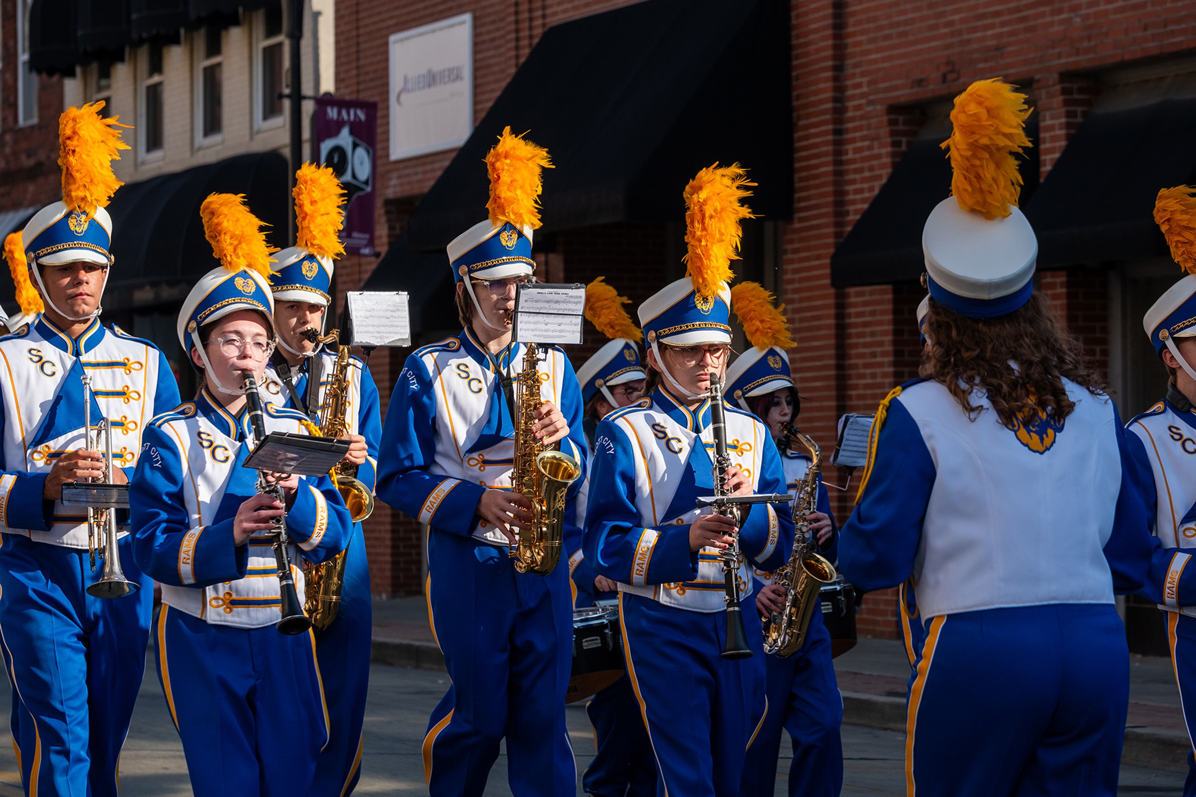 Scott City High School Marching Band members perform with intense focus.
