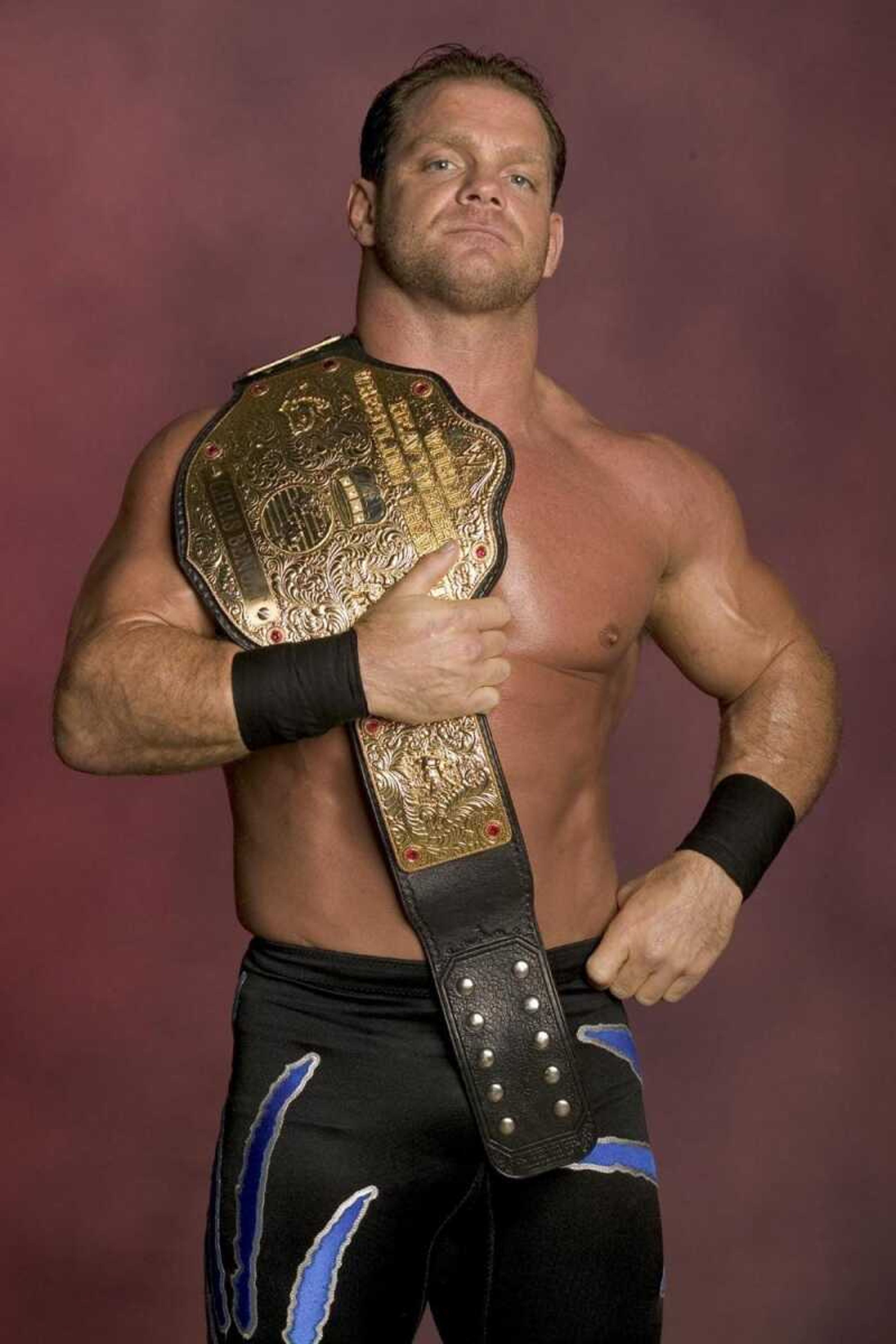 Chris Benoit posed in 2004 for a World Wrestling Entertainment publicity photo. Benoit and his wife and son were found dead Monday. (Associated Press file)