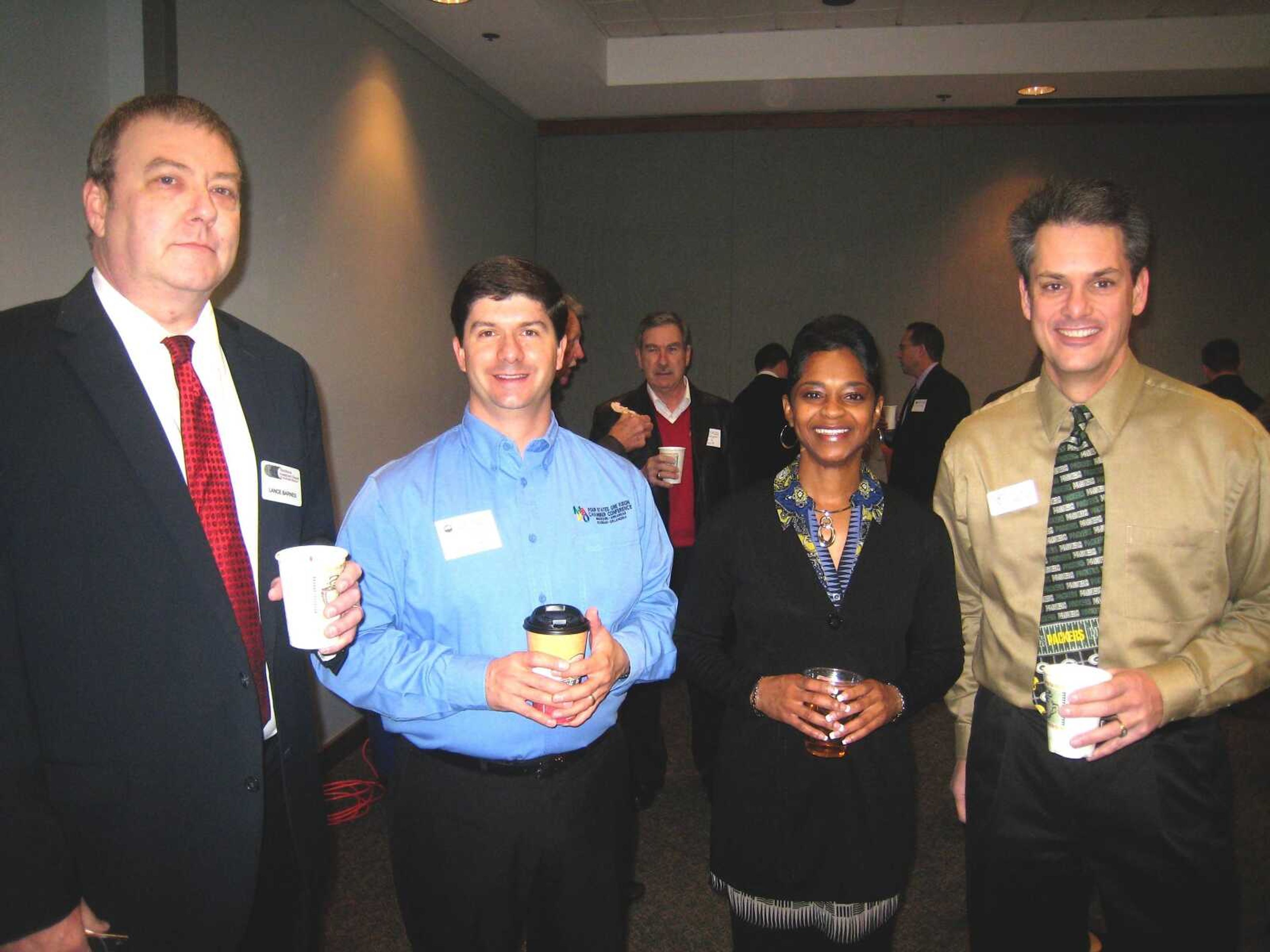 Lance Barnes, Workforce Investment Board of Southeast Missouri;
Tim Arbeiter, Cape Girardeau Area Chamber of Commerce Vice President of Community Development, Old Town Cape; Allysia Long, Workforce Investment Board of Southeast Missouri and
John McGowan, Love INC of Southeast MIssouri at the Cape Girardeau Area Chamber of Commerce First Friday Coffee Friday, Jan. 4, at the Show Me Center in Cape Girardeau.