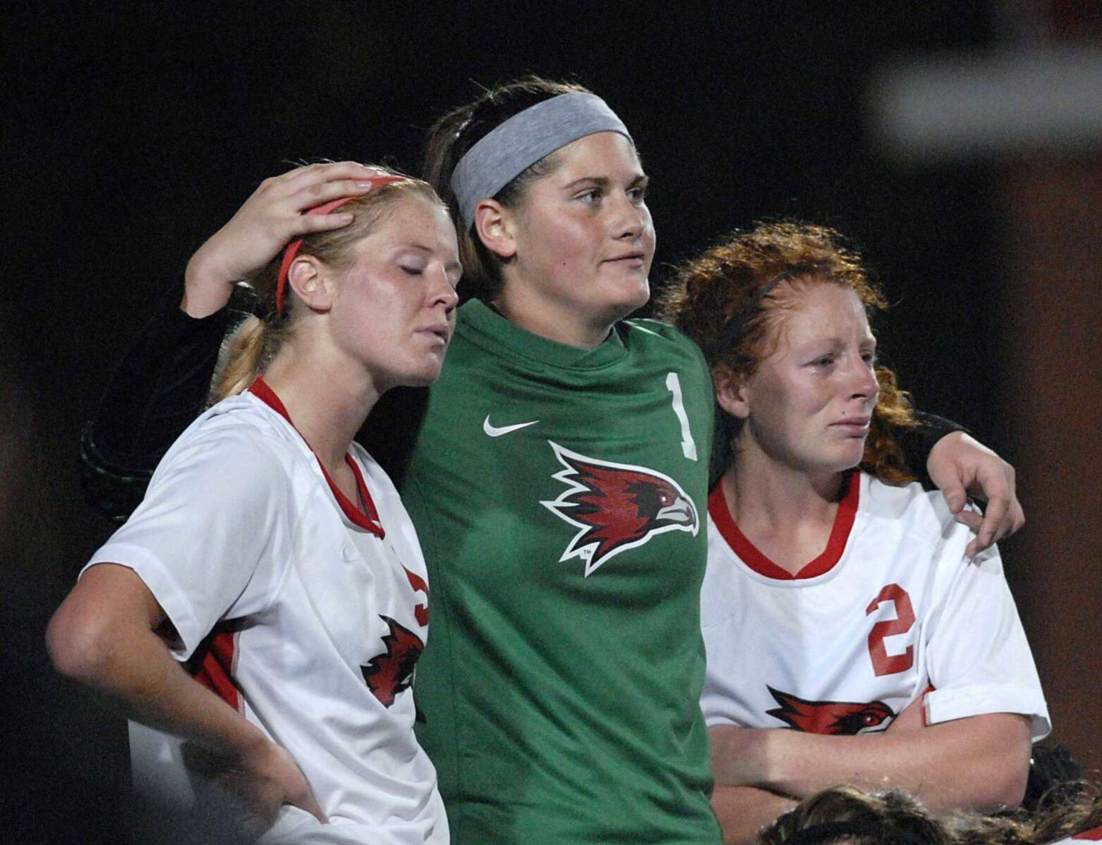 Southeast Missouri State's Shona Goodwin, Ashton Aubuchon and Meg Herndon, from left, react to the team's 2-1 loss to Morehead State during an OVC Tournament game on Friday, Nov. 4, 2011, at Houck Stadium in Cape Girardeau. (Kristin Eberts)