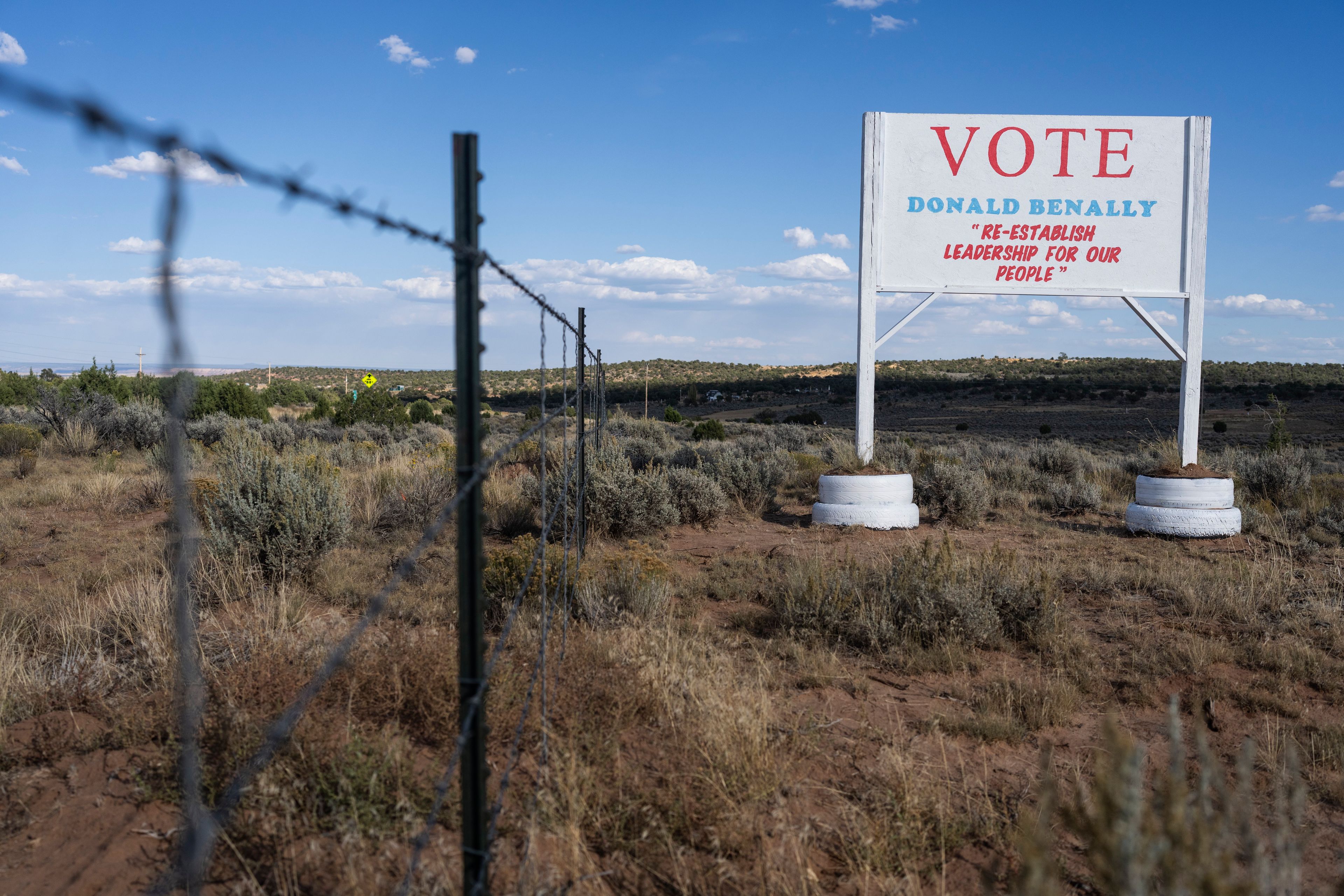 A roadside promotes a candidate competing in a tribal election, on the Navajo Nation in Ganado, Ariz., Wednesday, Oct. 16, 2024. (AP Photo/Rodrigo Abd)