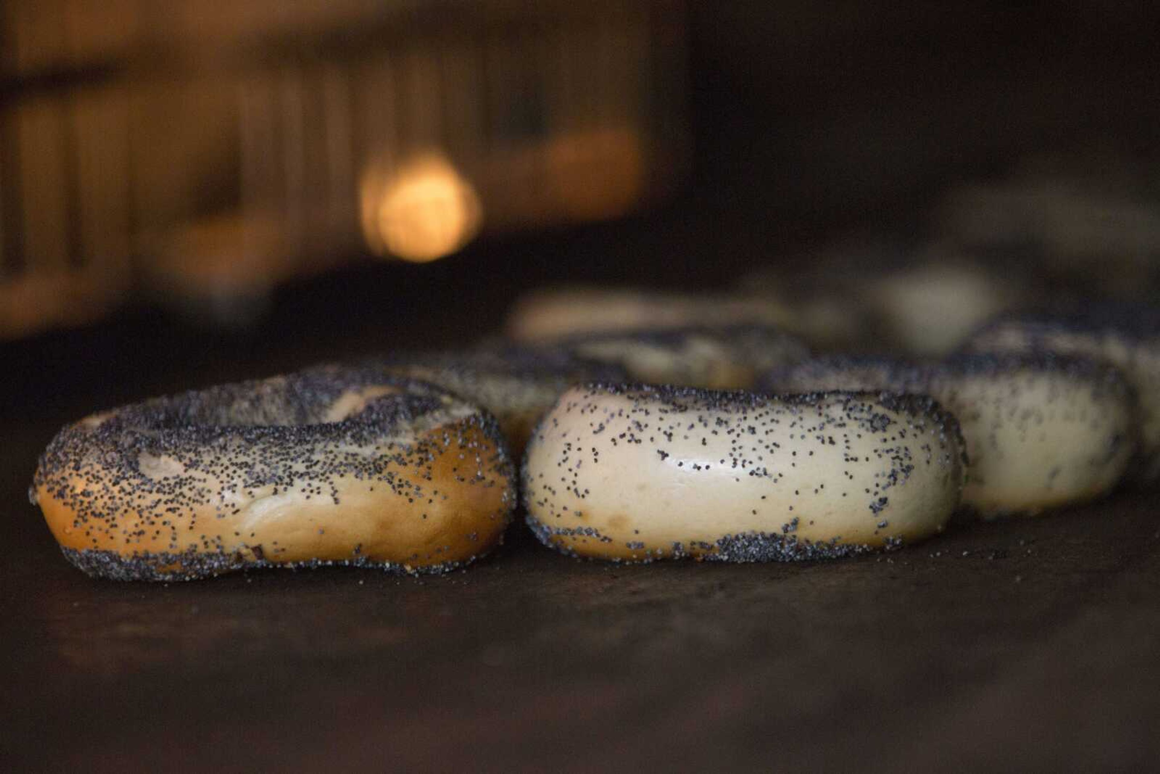 Bagels are seen in the wood burning oven at Black Seed bagel shop in the East Village neighborhood of New York on Friday, May 27. (AP Photo/Mary Altaffer)