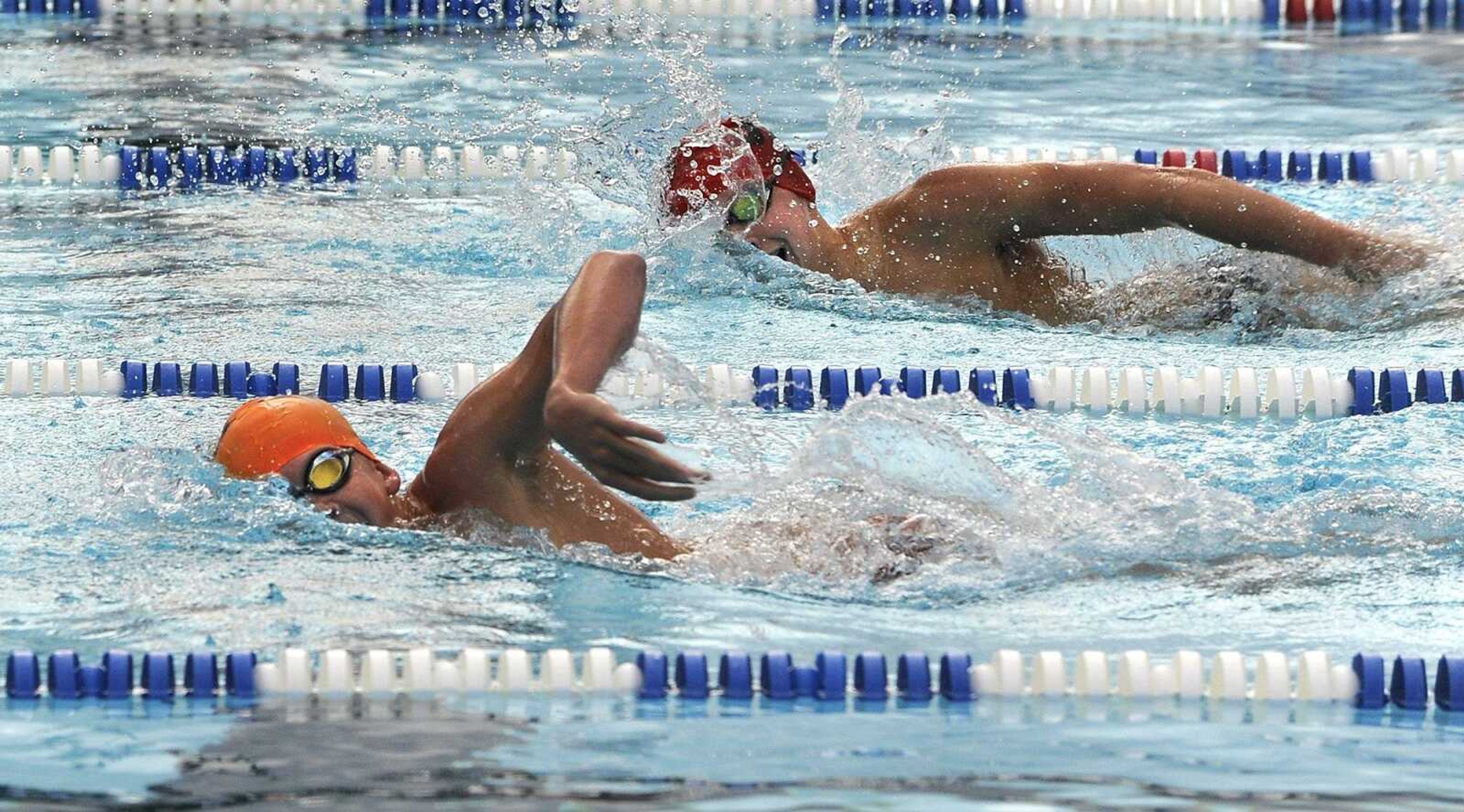 Cape Girardeau Central's Daniel Seabaugh, left, and Jackson's Jack Gard swim in the 500 freestyle Tuesday, Aug. 23, 2016 at Central Municipal Pool.