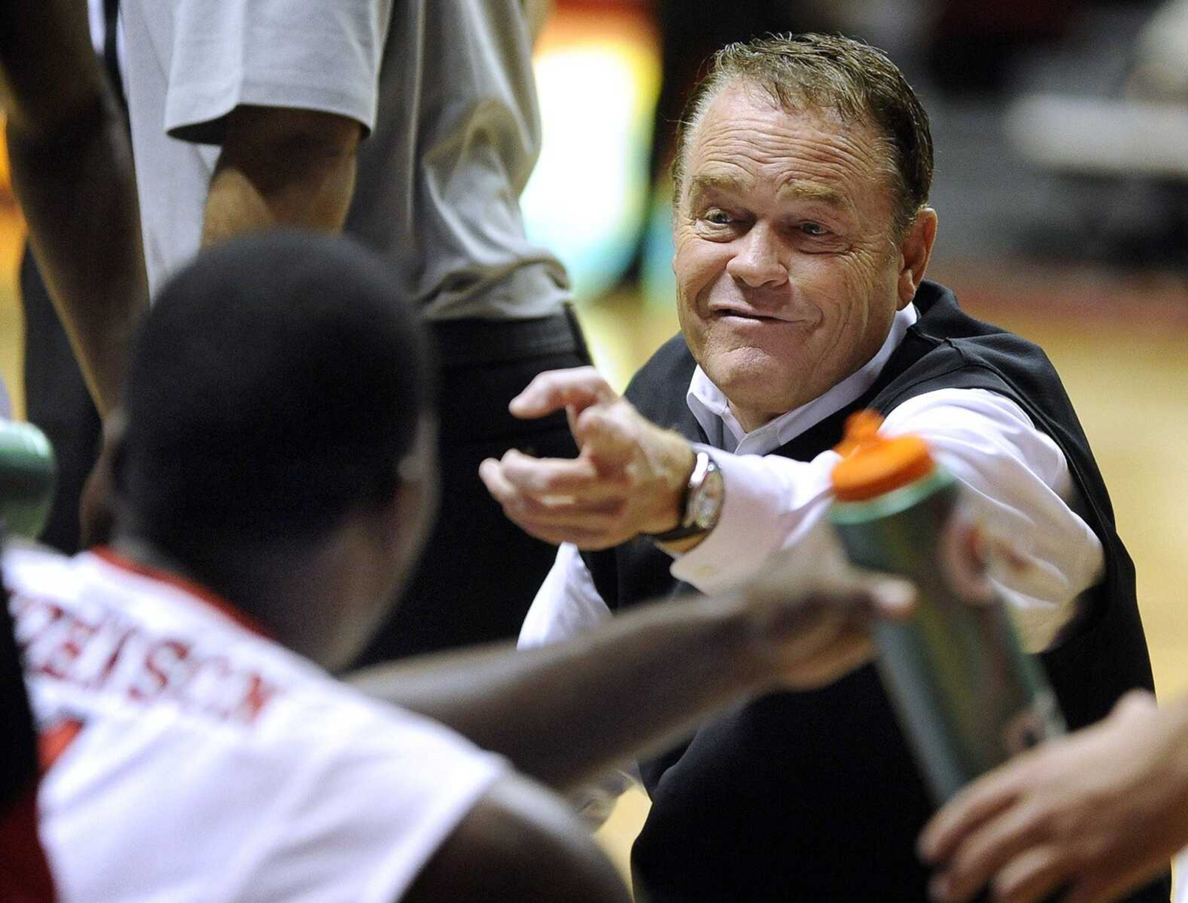 Southeast Missouri State coach Dickey Nutt talks to Nino Johnson during a timeout in the second half against Missouri Baptist on Monday, Nov. 3, 2014 at the Show Me Center. (Fred Lynch)