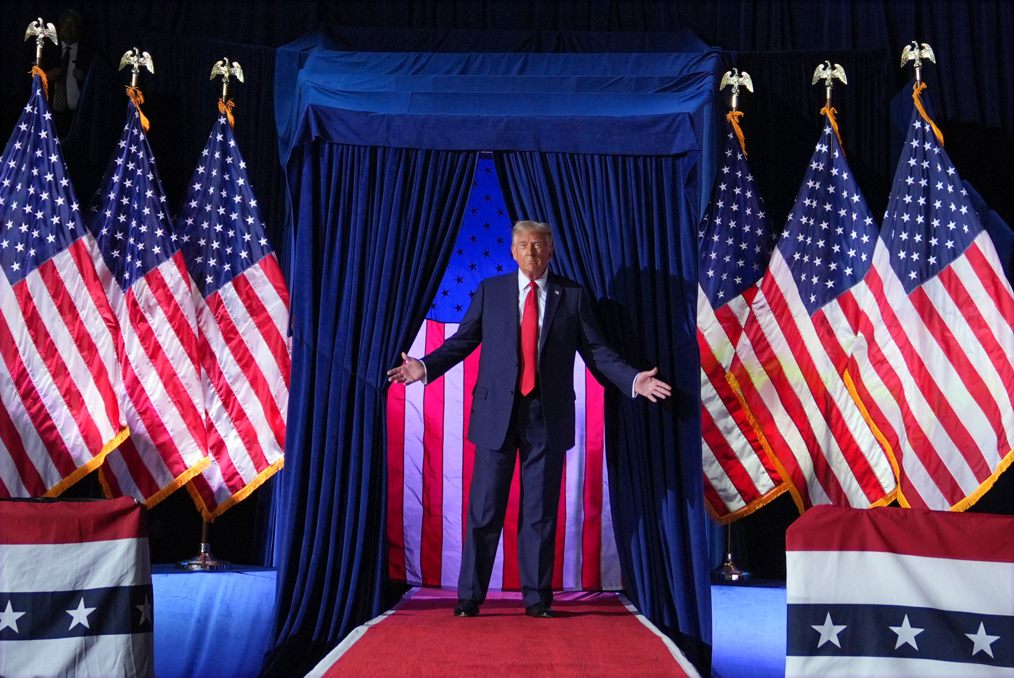 Republican presidential nominee former President Donald Trump arrives for a campaign rally at Van Andel Arena, Tuesday, Nov. 5, 2024, in Grand Rapids, Mich. (AP Photo/Evan Vucci)