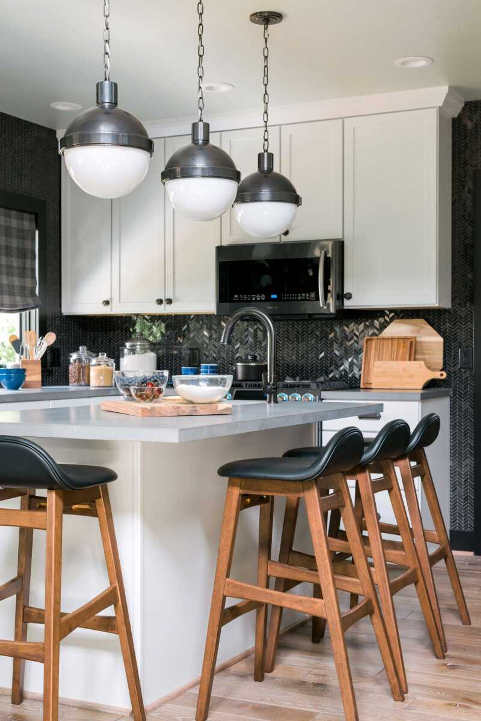 In this undated photo provided by HGTV, a large center island used for cooking prep and dining is shown in a kitchen in Ann Arbor, Mich., and can actually make a small kitchen seem larger, says Brian Patrick Flynn, who designed this kitchen for the HGTV Urban Oasis 2016 house giveaway