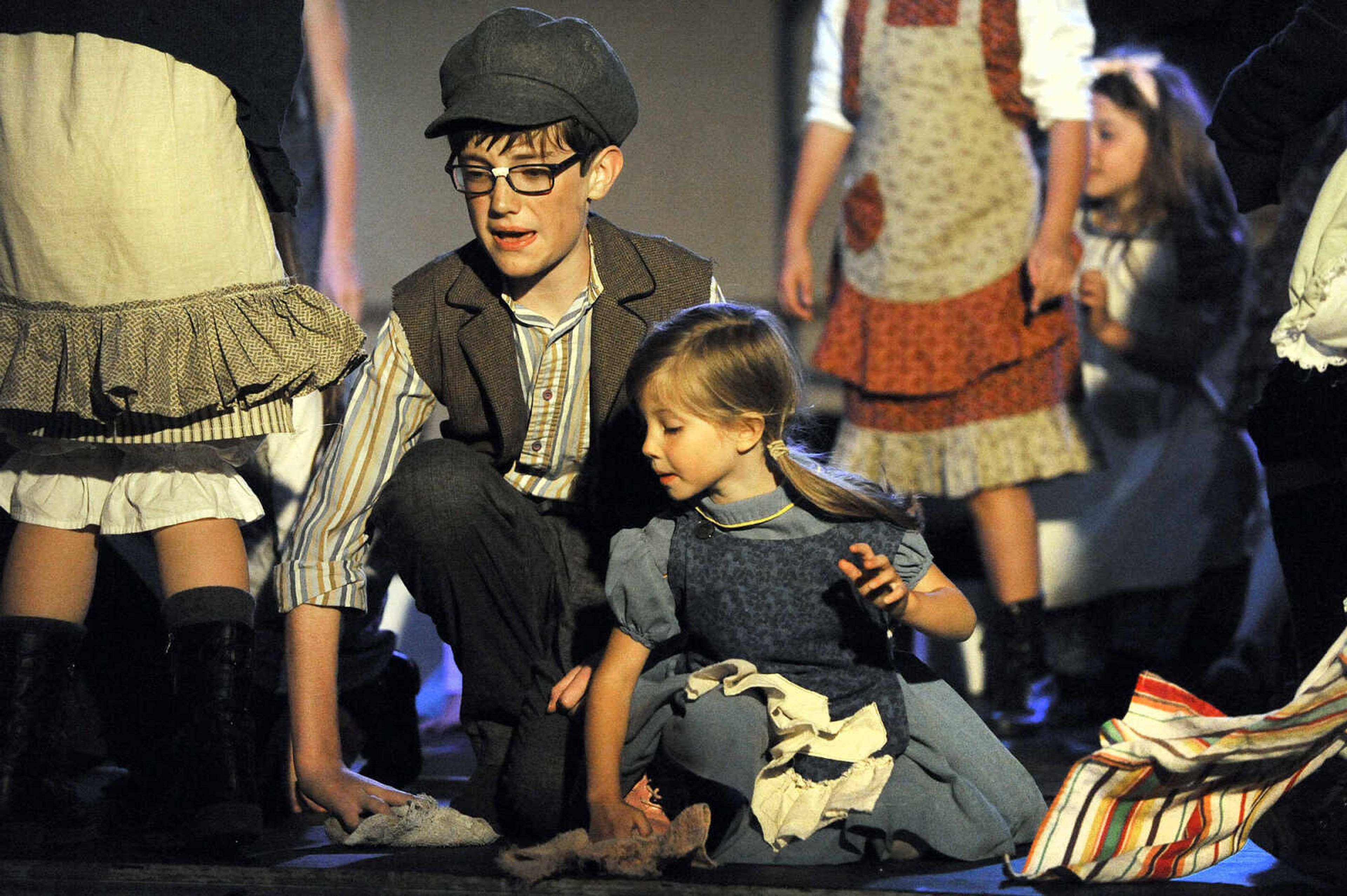 LAURA SIMON ~ lsimon@semissourian.com

Cast members rehearse for "Annie Jr." Wednesday night, May 4, 2016, at The Venue in Cape Girardeau. The condensed version of "Annie" is being produced by On Cue Performing Arts Studio, and the not-for-profit local theater group Acting Out!.