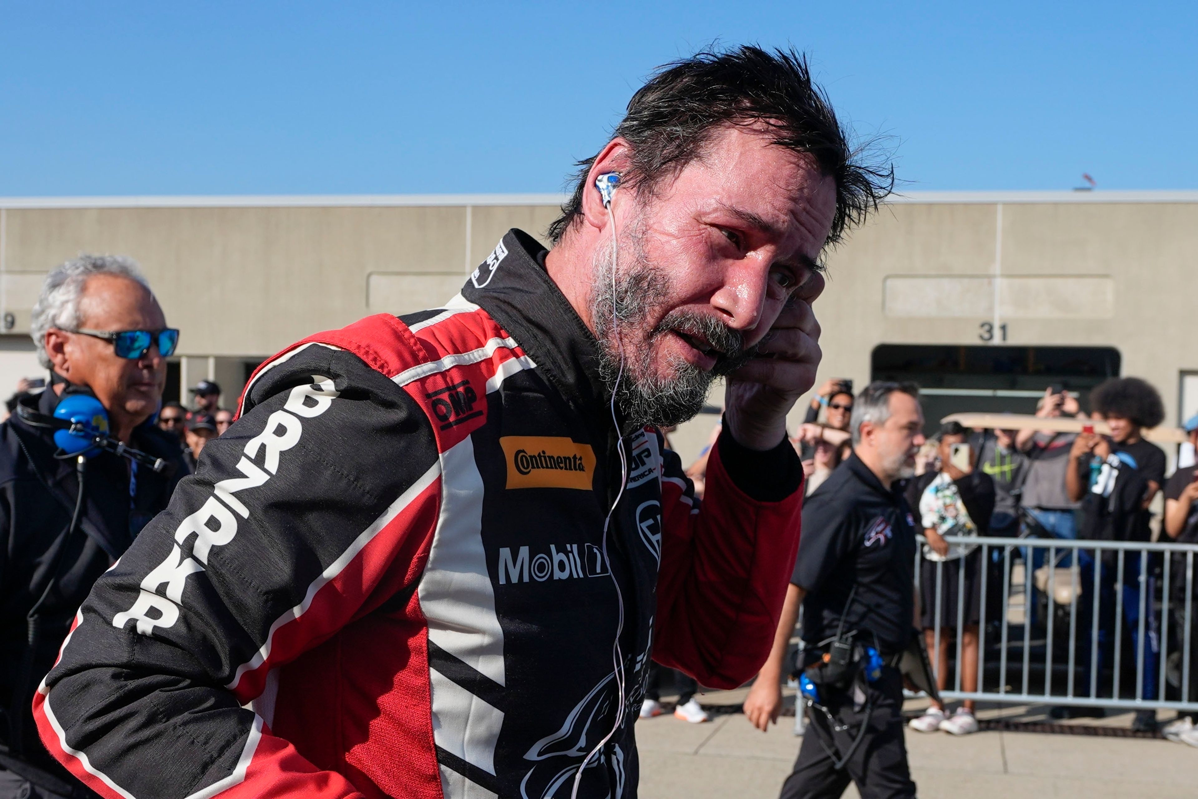 Keanu Reeves spins out at Indianapolis Motor Speedway in pro auto racing debut