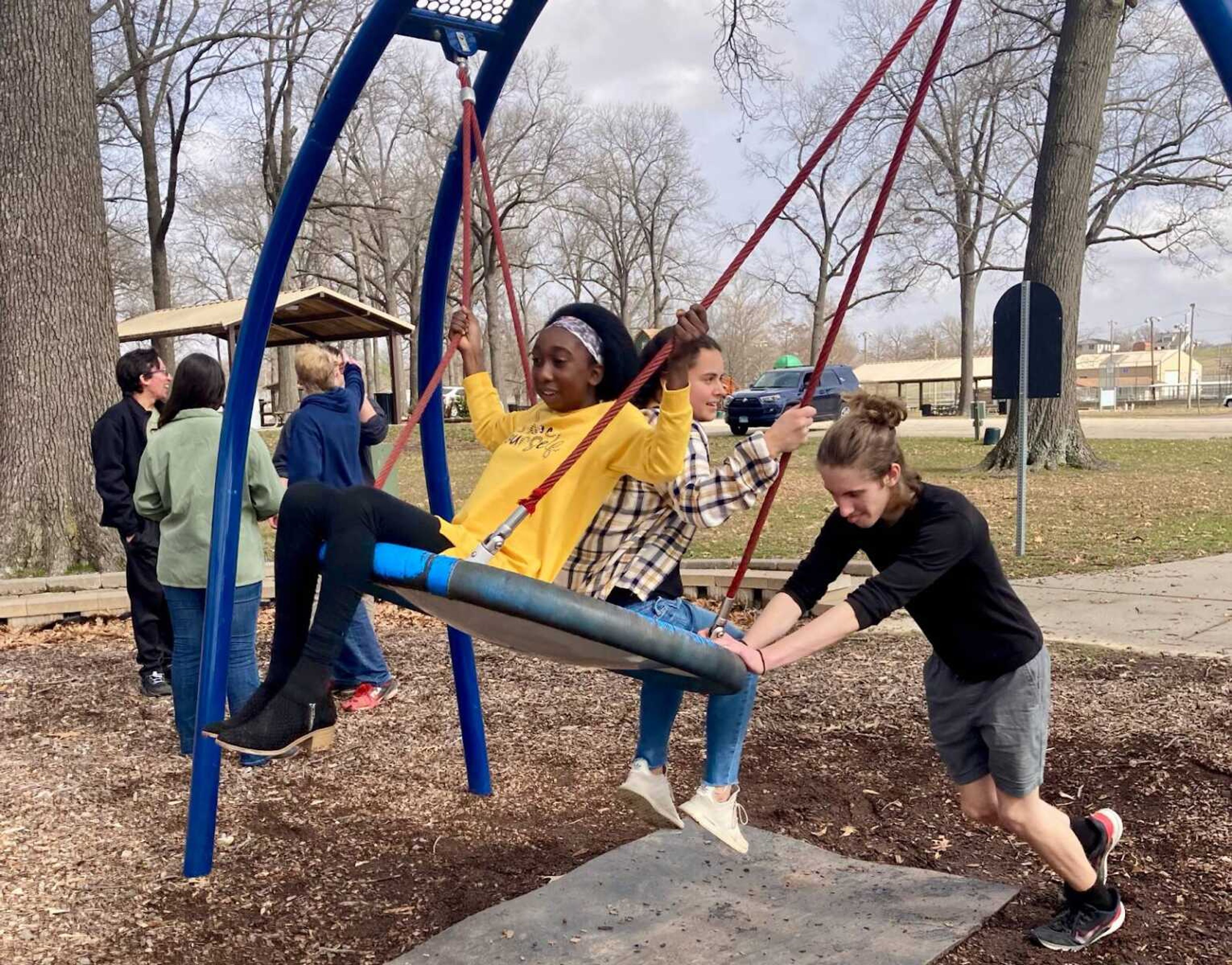 Emmanuella swinging with new friends, Josiah Armstrong and Jaylee Panice