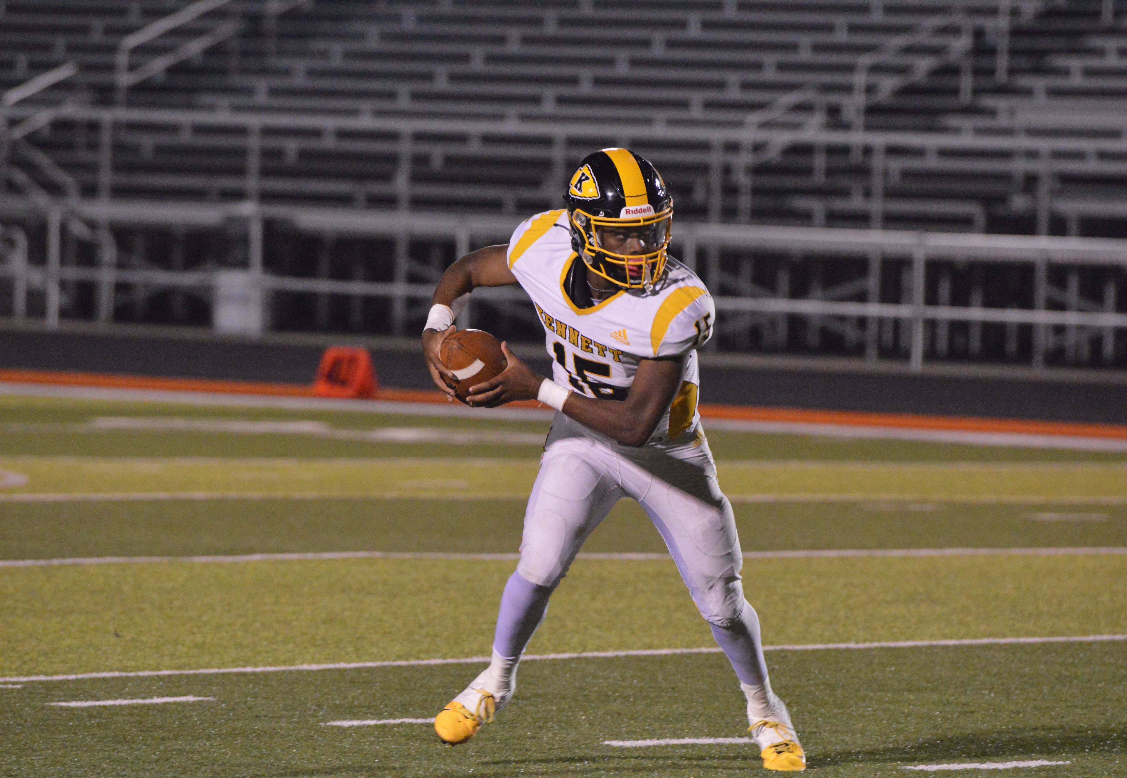 Kennett junior quarterback Ty Jones scrambles out of the pocket against Cape Central on Friday, Oct. 25.