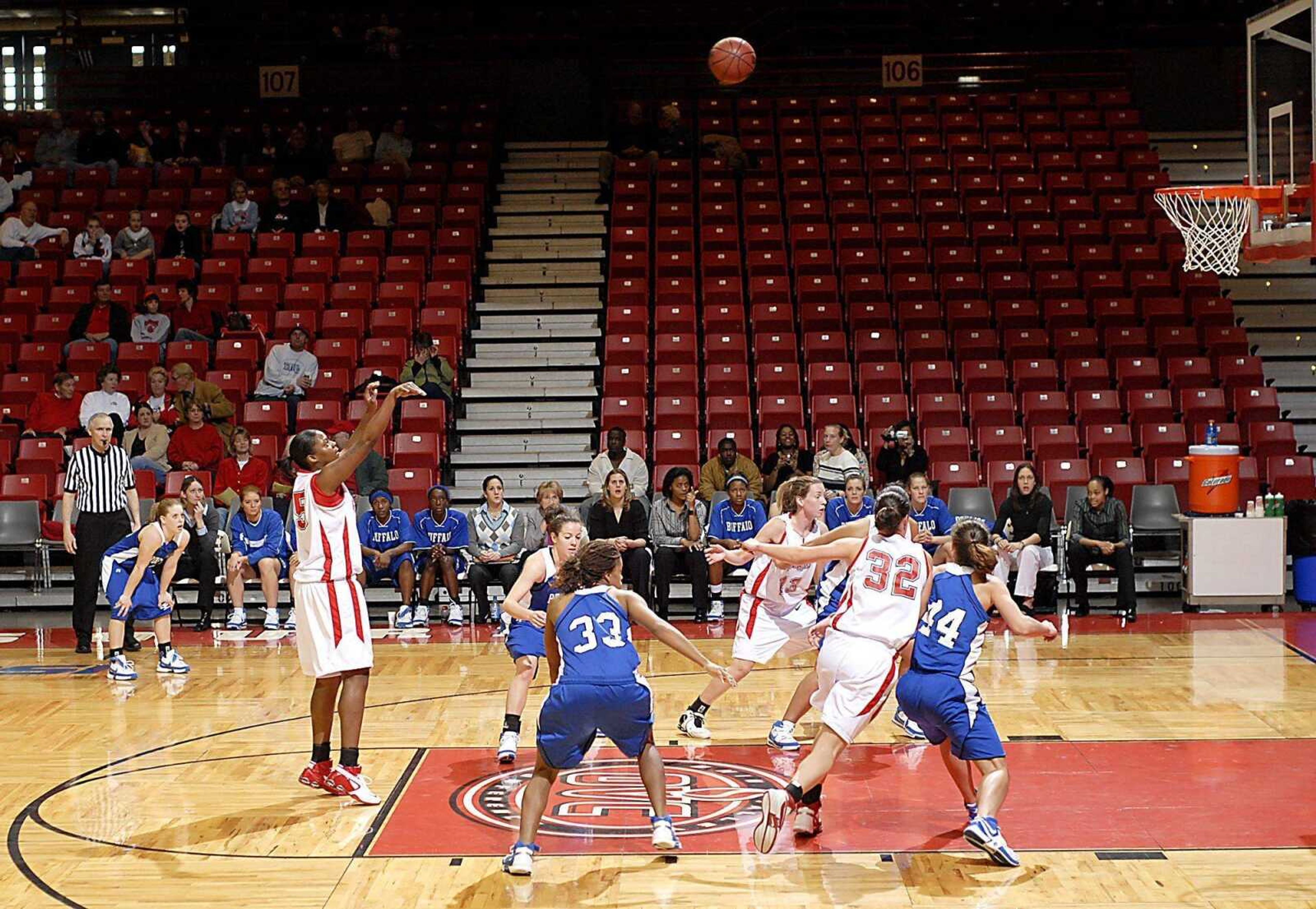 ABOVE: Missy Whitney tossed up a free throw Saturday as the Redhawks took on the Buffalo Bulls at the Show Me Center. BELOW: Ashley Lovelady defended as Bulls senior Stephanie Bennett tried to inbound the ball. (Kit Doyle)