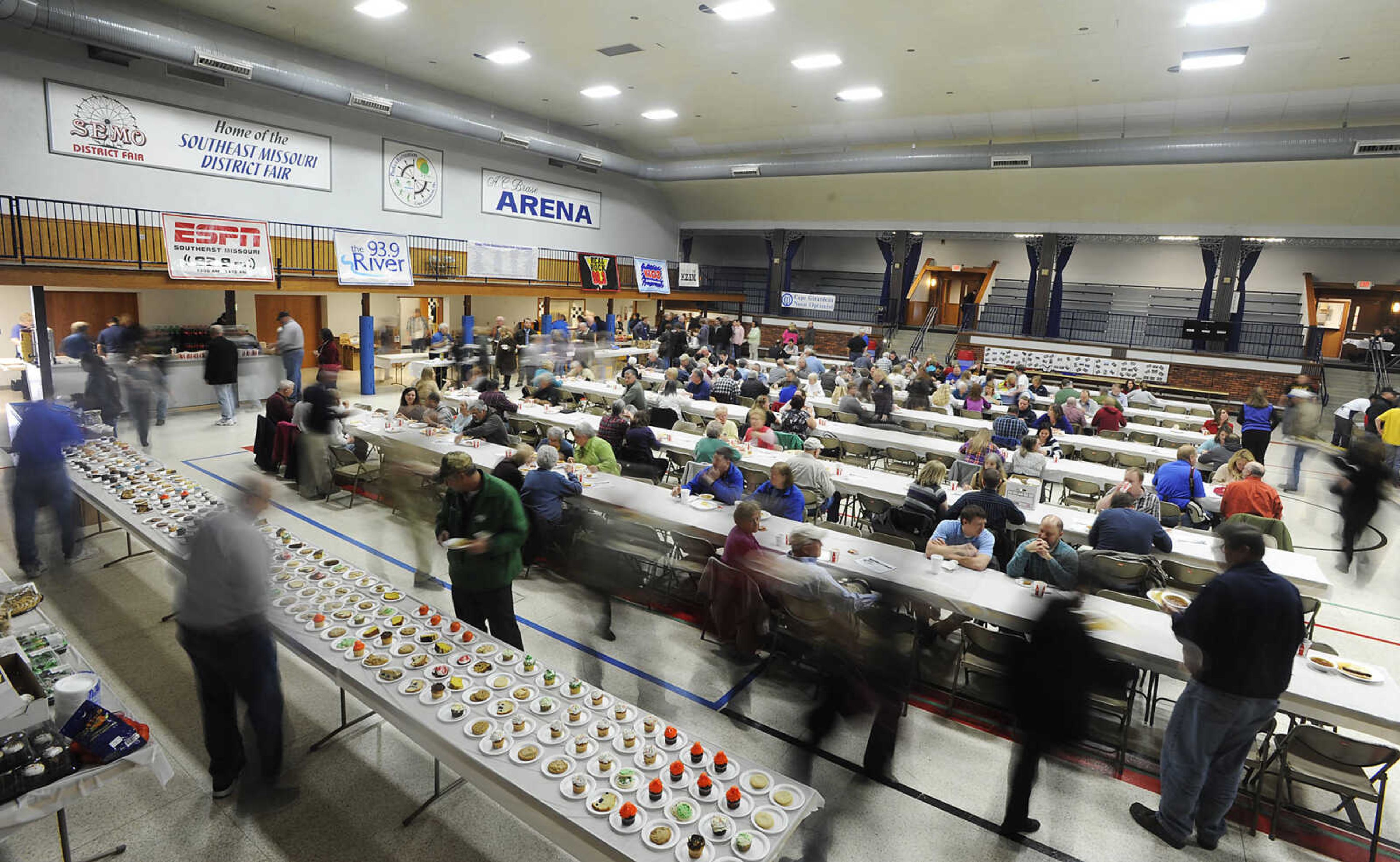 People crowd the A.C. Brase Arena Building for the Noon Optimist Chili Day Wednesday, March 6, in Cape Girardeau. The service club used 540 lbs., of meat to make 440 gallons of chili that was served alongside 2,000 hot dogs at the annual fundraiser. Proceeds from the event go to fund the group's service projects.