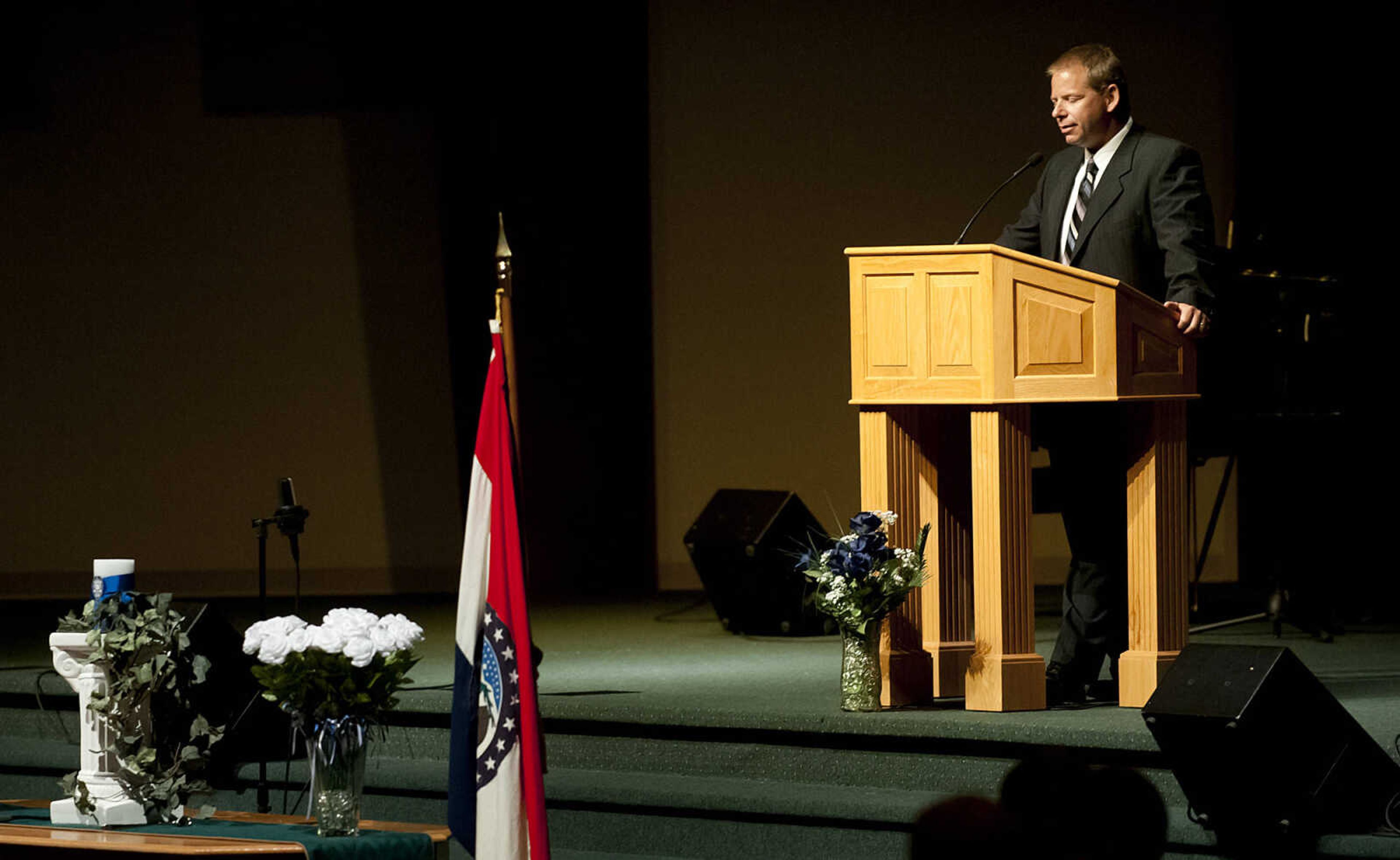 James Green, associate pastor at Cape Bible Chapel, leads the closing prayer during the Senior and Lawmen Together Law Enforcement Memorial Friday, May 9, at the Cape Bible Chapel. The annual memorial honored the 48 Southeast Missouri law enforcement officers that have died in the line of duty since 1875.